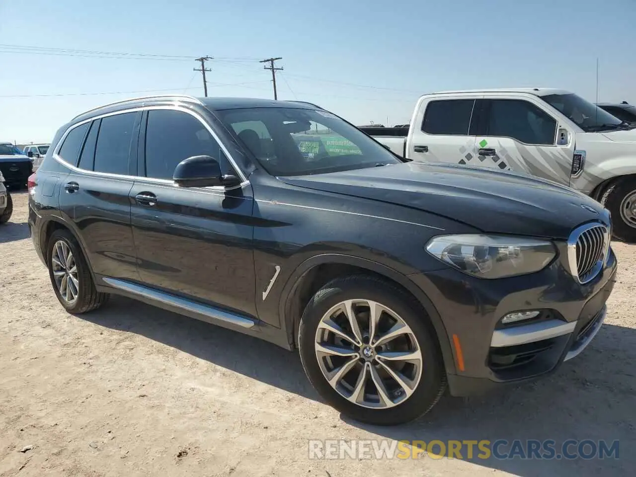 4 Photograph of a damaged car 5UXTR9C54KLP77893 BMW X3 2019