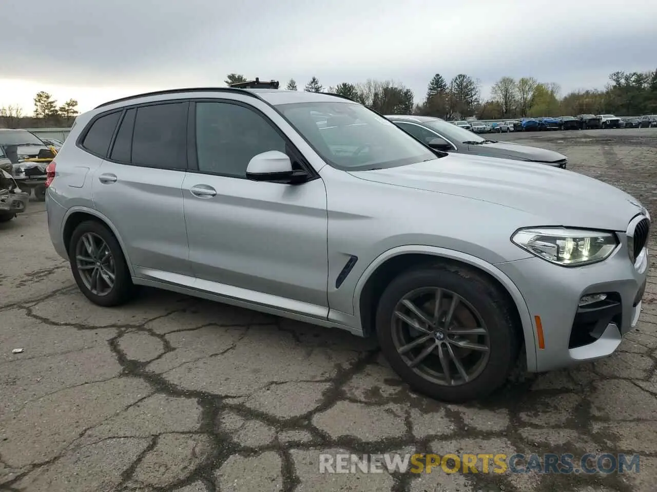 4 Photograph of a damaged car 5UXTR9C54KLP97724 BMW X3 2019