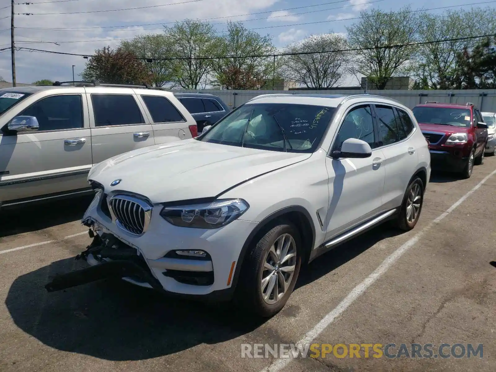 2 Photograph of a damaged car 5UXTR9C55KLD94936 BMW X3 2019