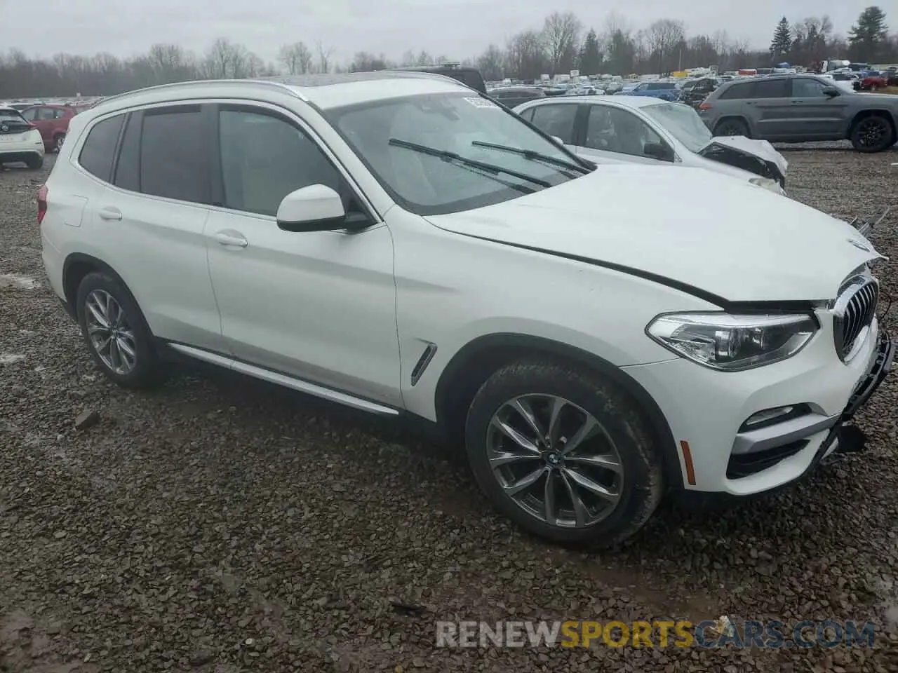 4 Photograph of a damaged car 5UXTR9C55KLP96405 BMW X3 2019