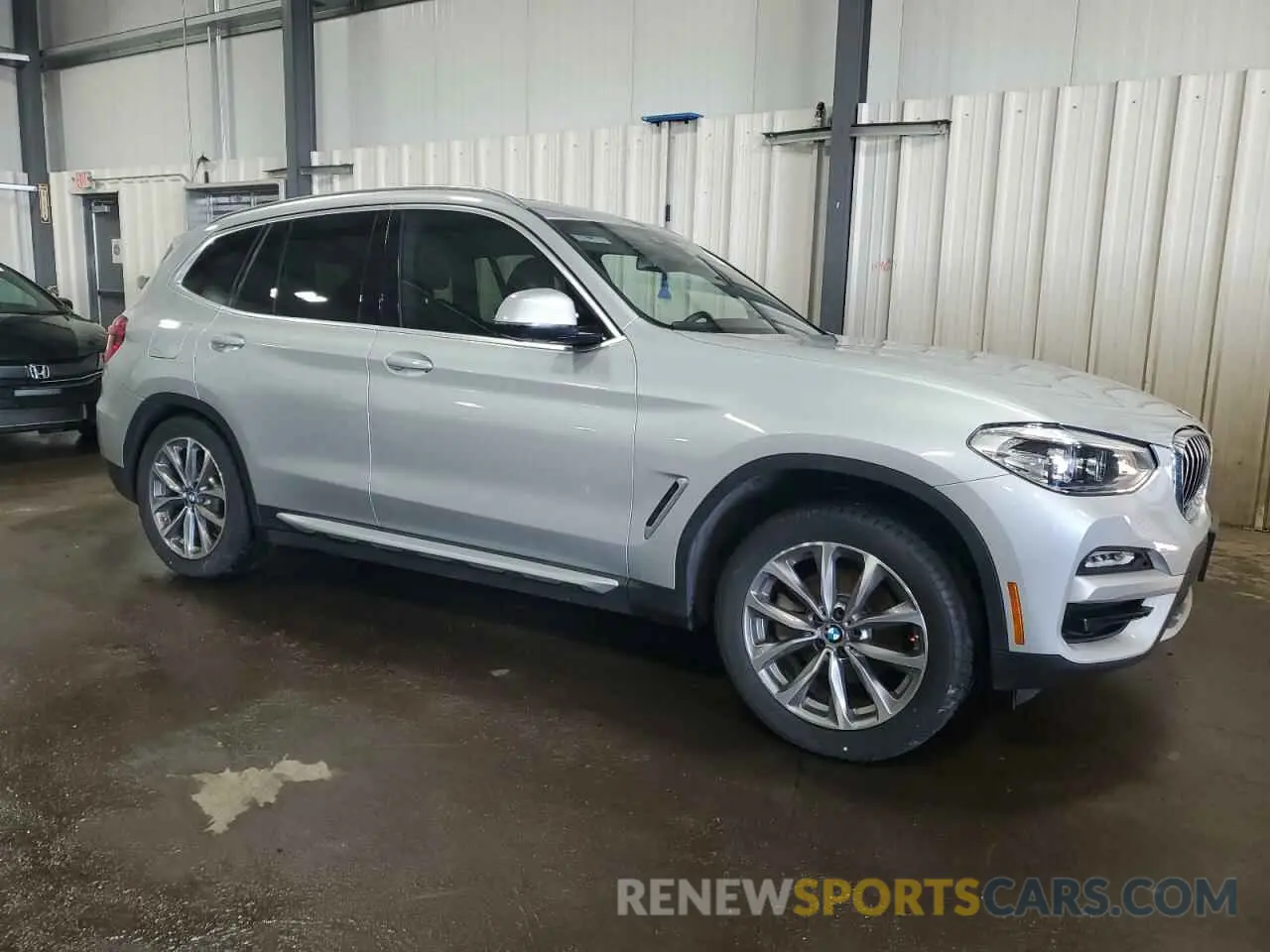 4 Photograph of a damaged car 5UXTR9C56KLP88863 BMW X3 2019