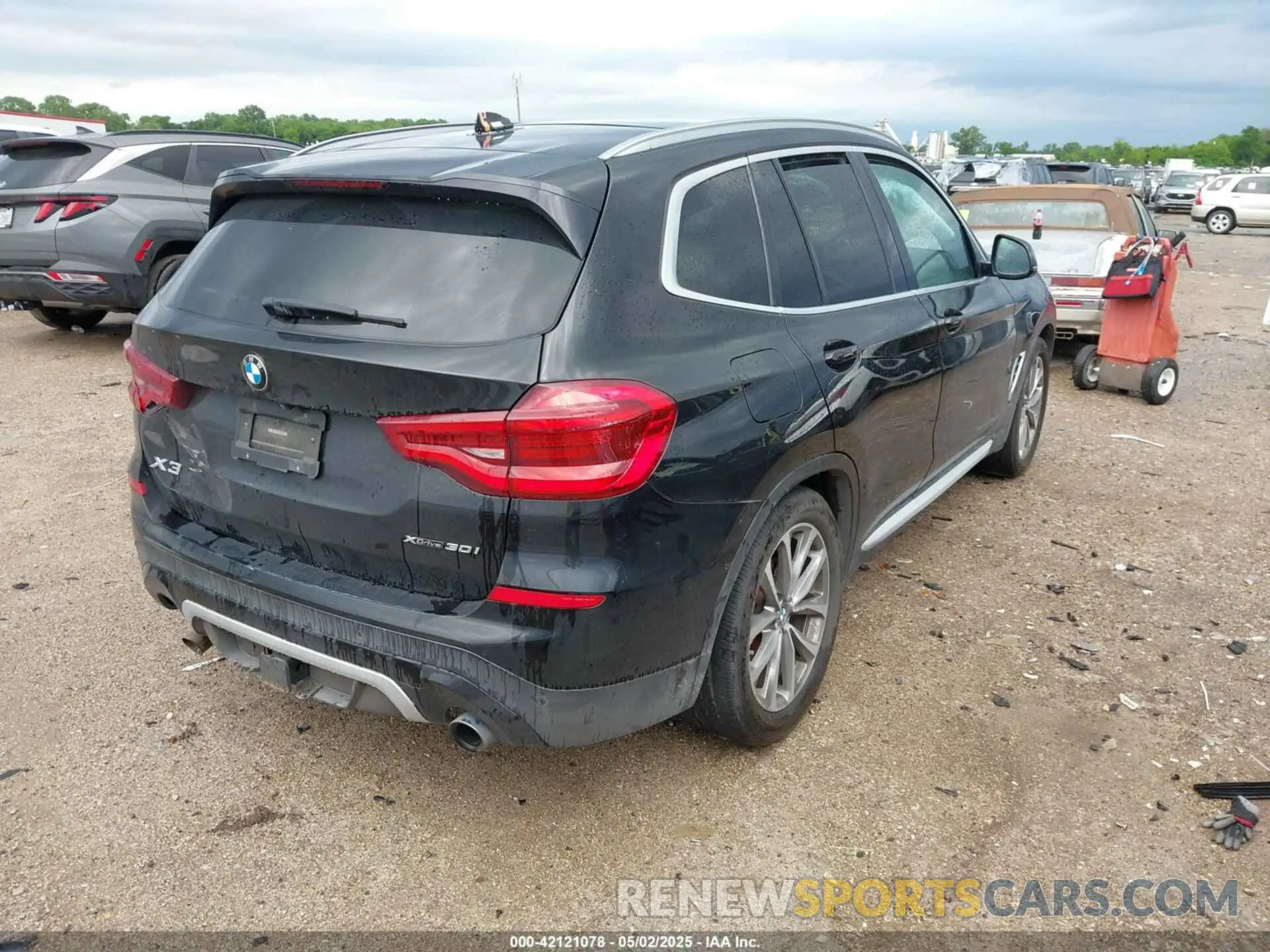 4 Photograph of a damaged car 5UXTR9C56KLP89852 BMW X3 2019