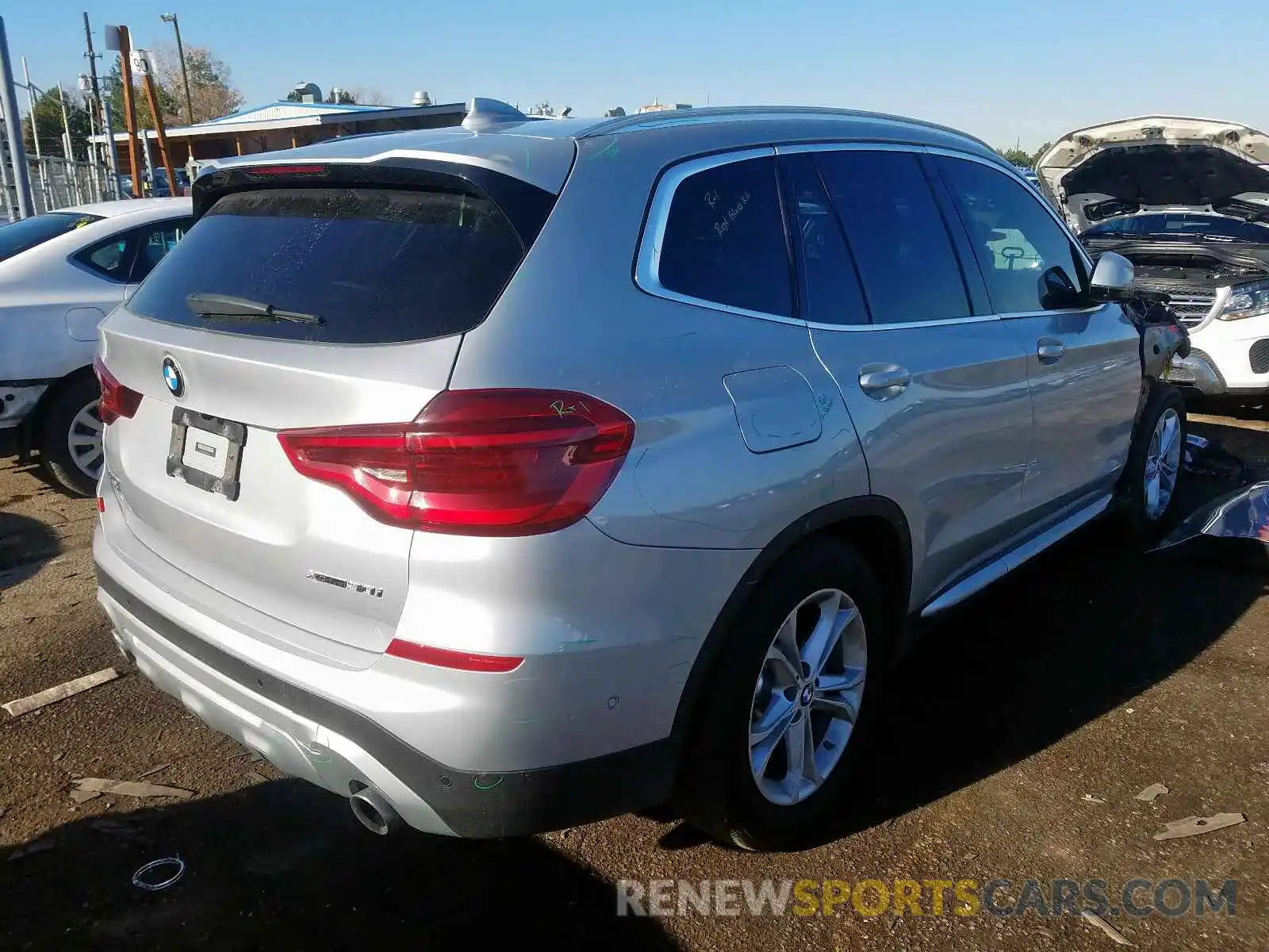 4 Photograph of a damaged car 5UXTR9C57KLP87463 BMW X3 2019