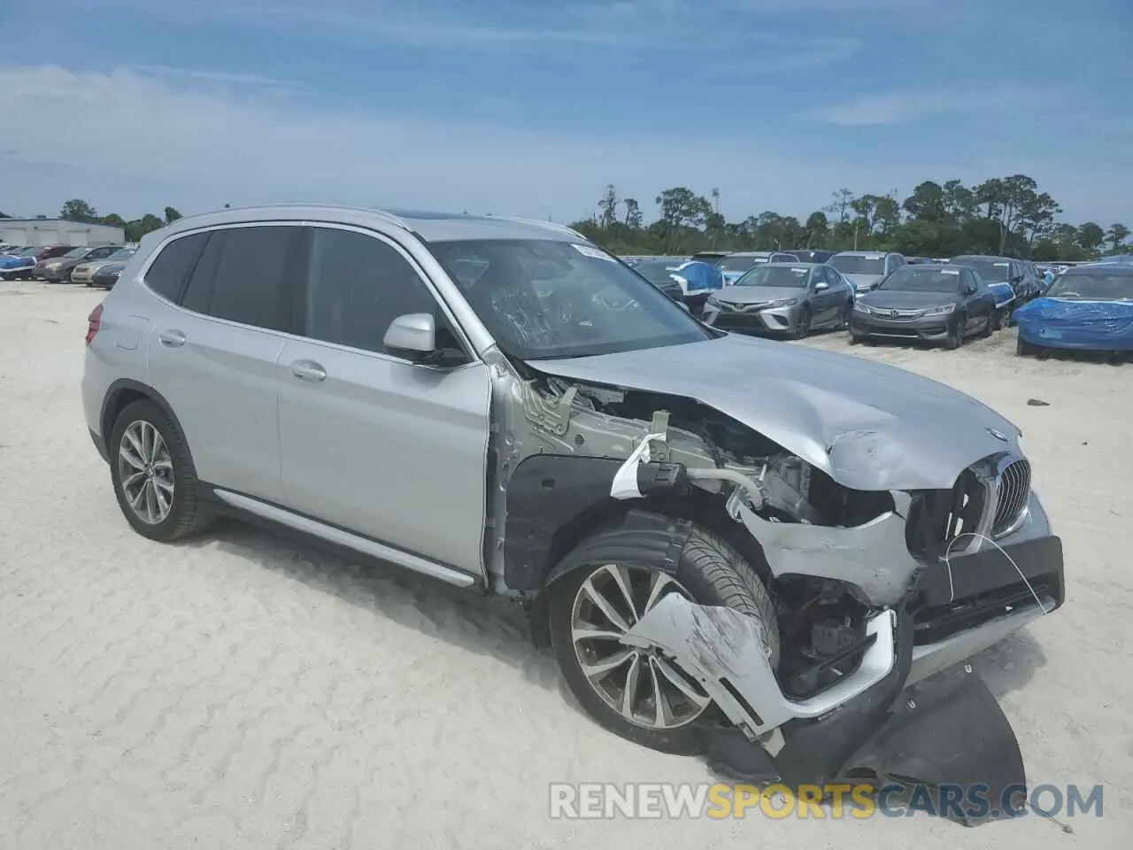 4 Photograph of a damaged car 5UXTR9C58KLD93442 BMW X3 2019