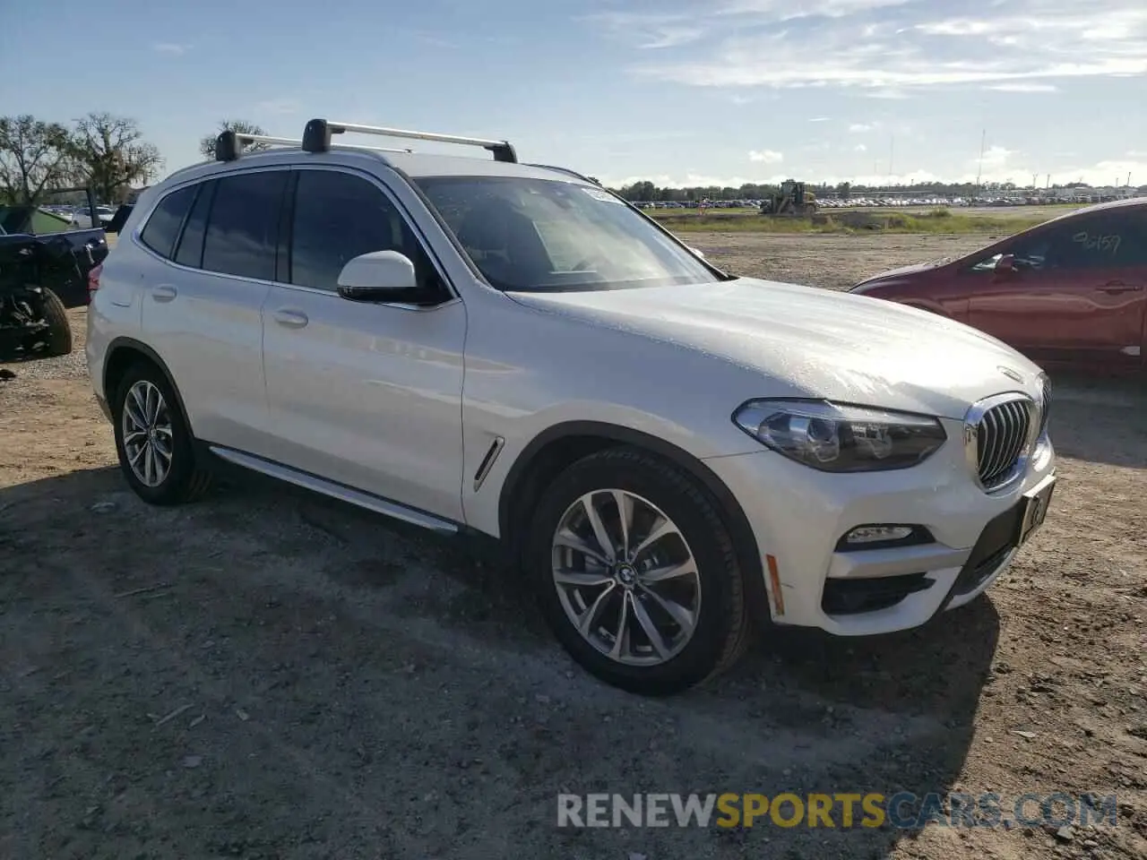 4 Photograph of a damaged car 5UXTR9C58KLE19988 BMW X3 2019