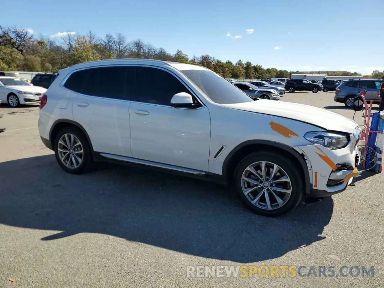 4 Photograph of a damaged car 5UXTR9C58KLP77864 BMW X3 2019