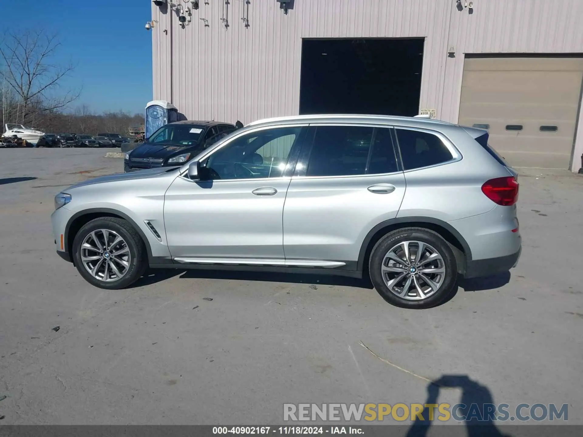 14 Photograph of a damaged car 5UXTR9C59KLD91733 BMW X3 2019