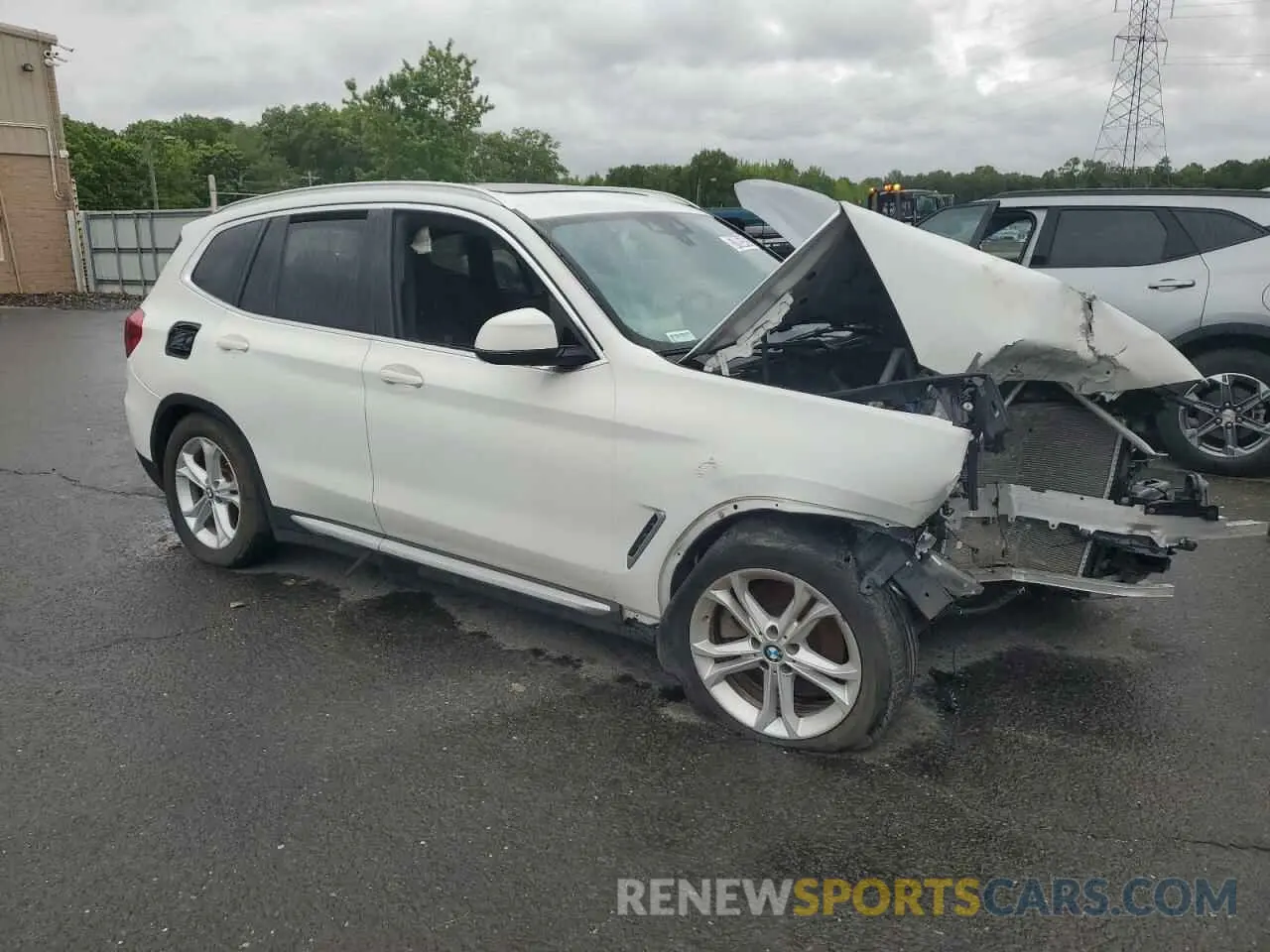 4 Photograph of a damaged car 5UXTR9C59KLE18316 BMW X3 2019
