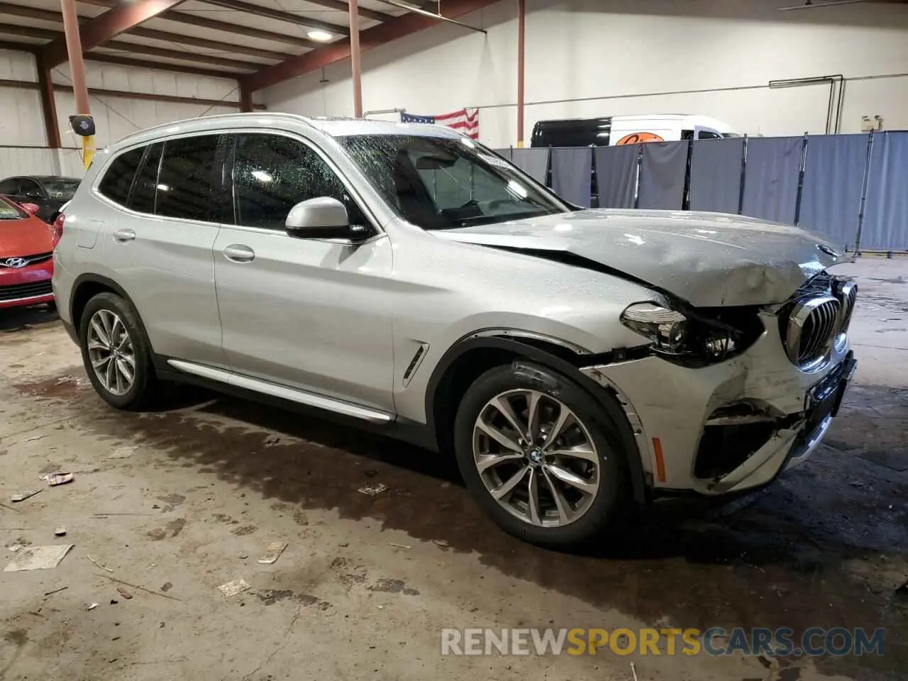 4 Photograph of a damaged car 5UXTR9C5XKLR06090 BMW X3 2019