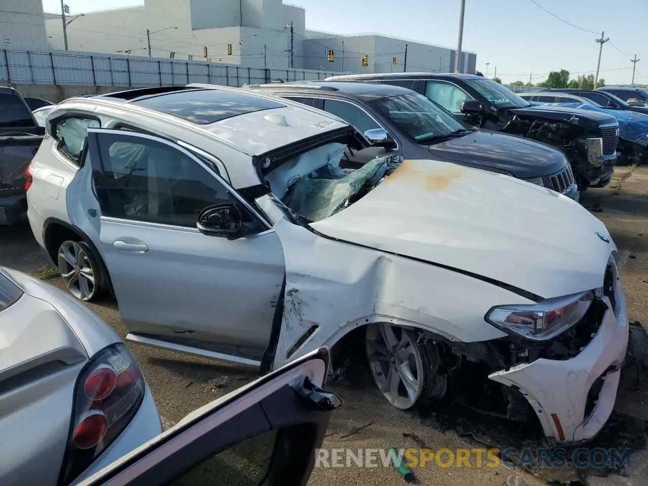 4 Photograph of a damaged car 5UXTY5C04L9B04359 BMW X3 2020
