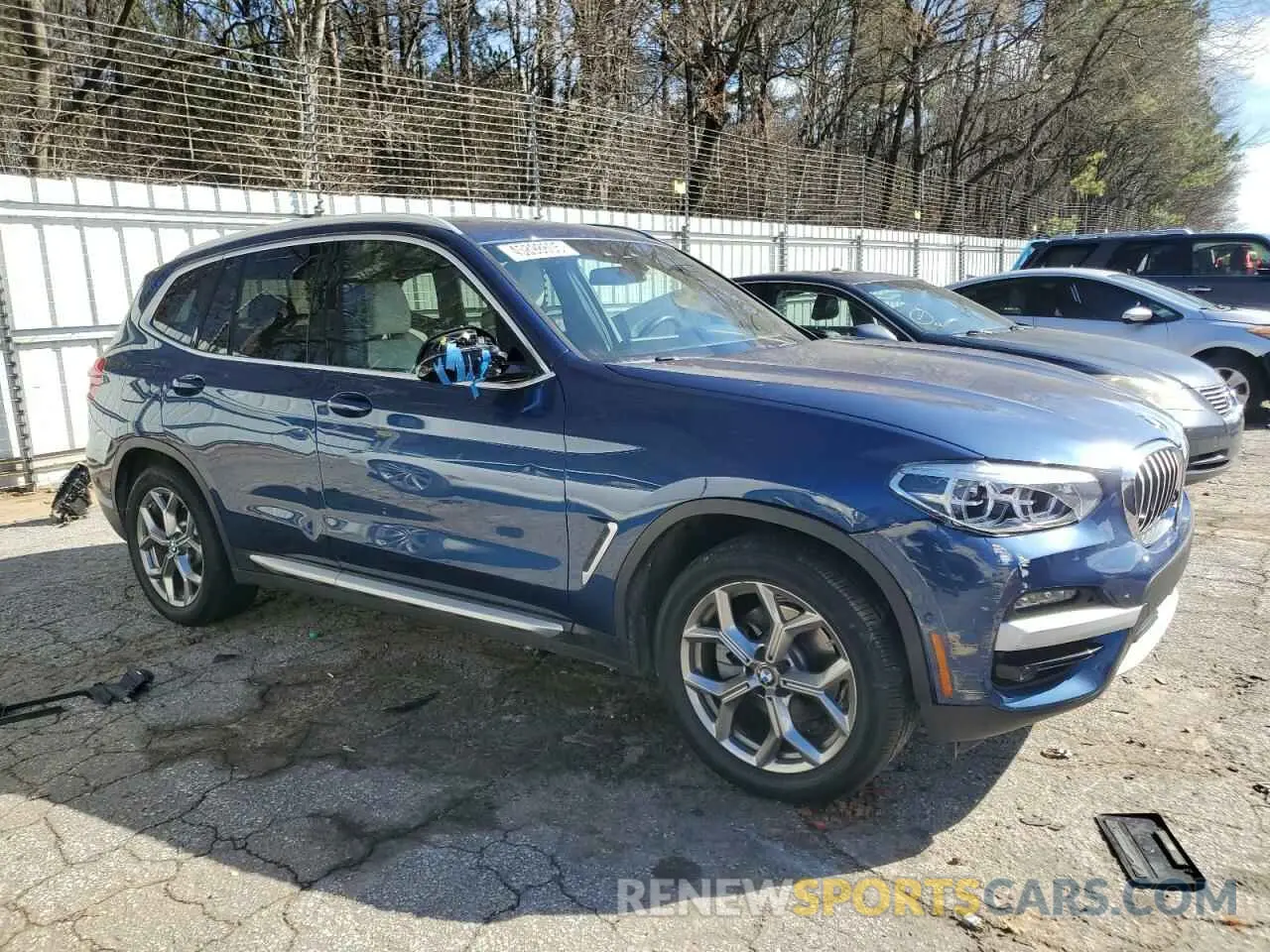 4 Photograph of a damaged car 5UXTY5C07L9D65002 BMW X3 2020