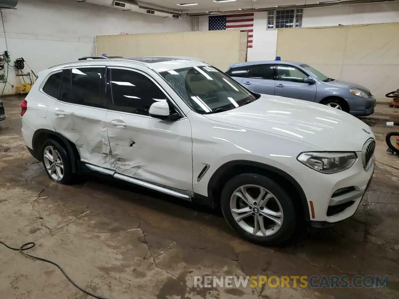 4 Photograph of a damaged car 5UXTY5C08LLE58291 BMW X3 2020