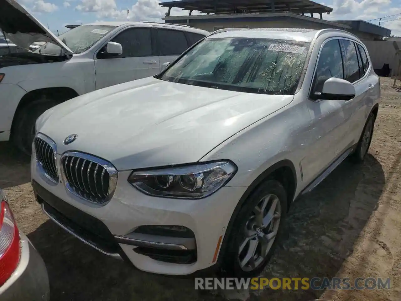 2 Photograph of a damaged car 5UXTY5C09L9D46211 BMW X3 2020