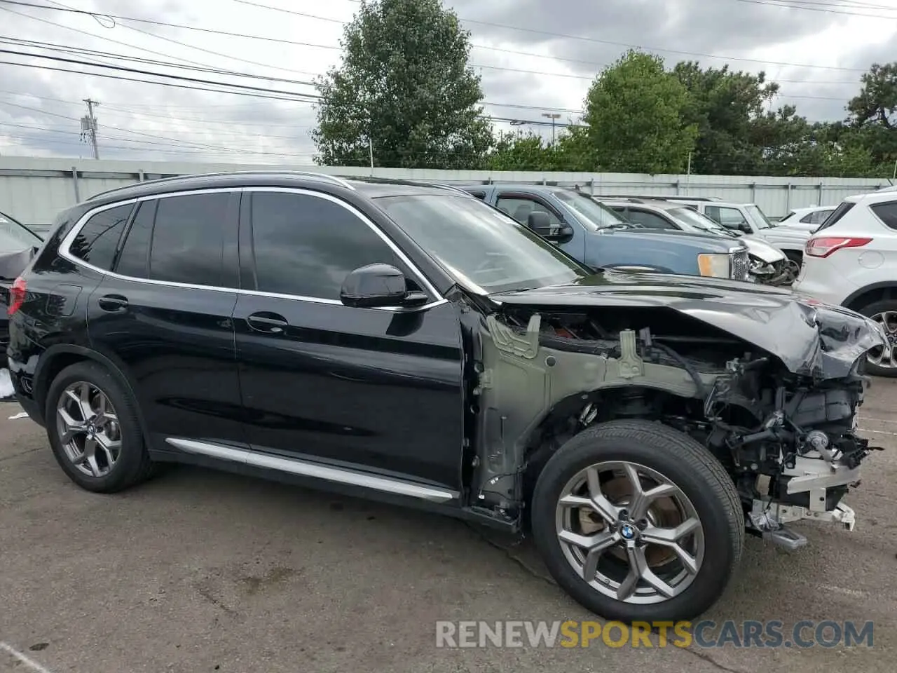 4 Photograph of a damaged car 5UXTS1C00M9E10521 BMW X3 2021