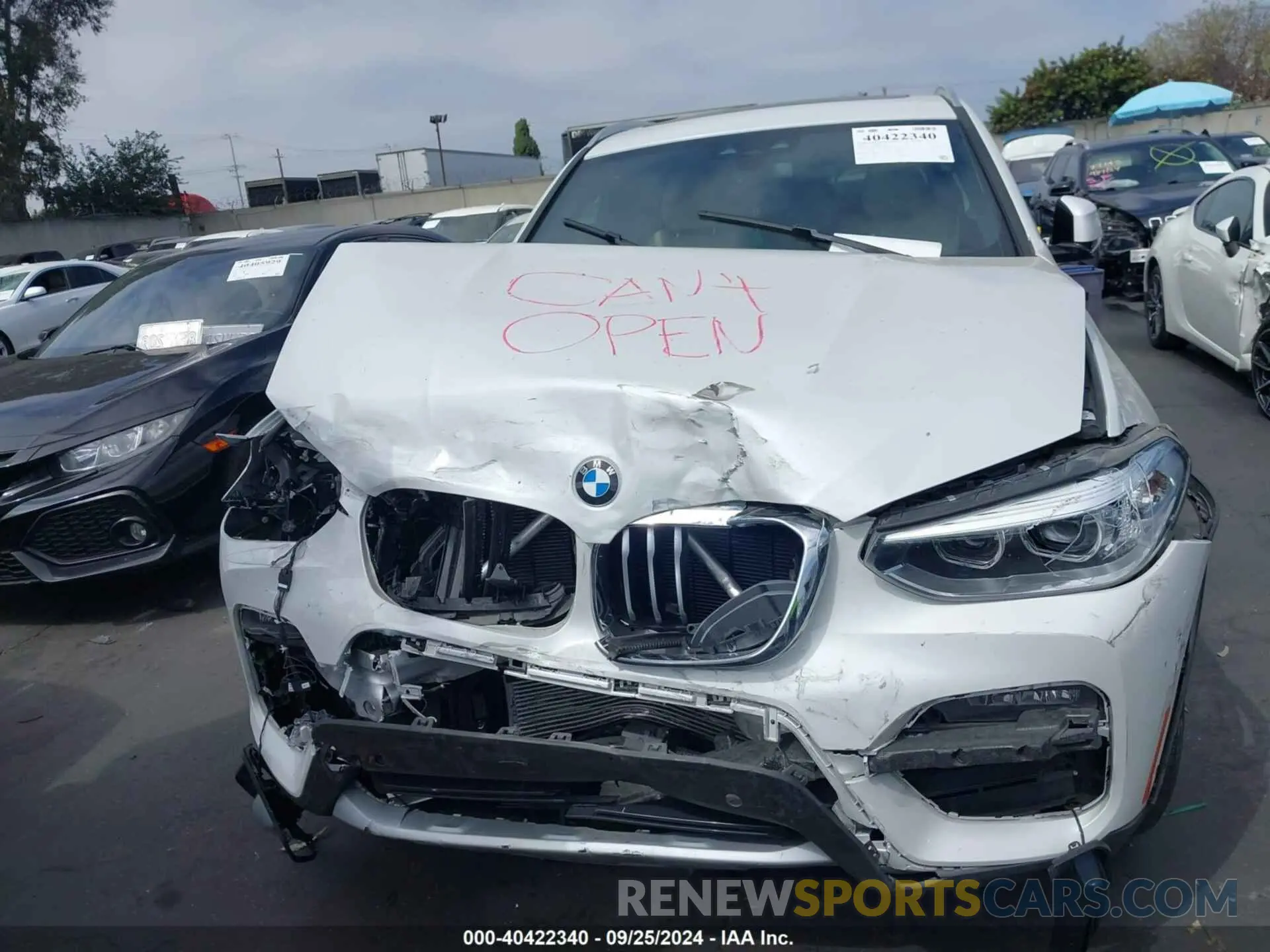 12 Photograph of a damaged car 5UXTY3C04M9E99729 BMW X3 2021