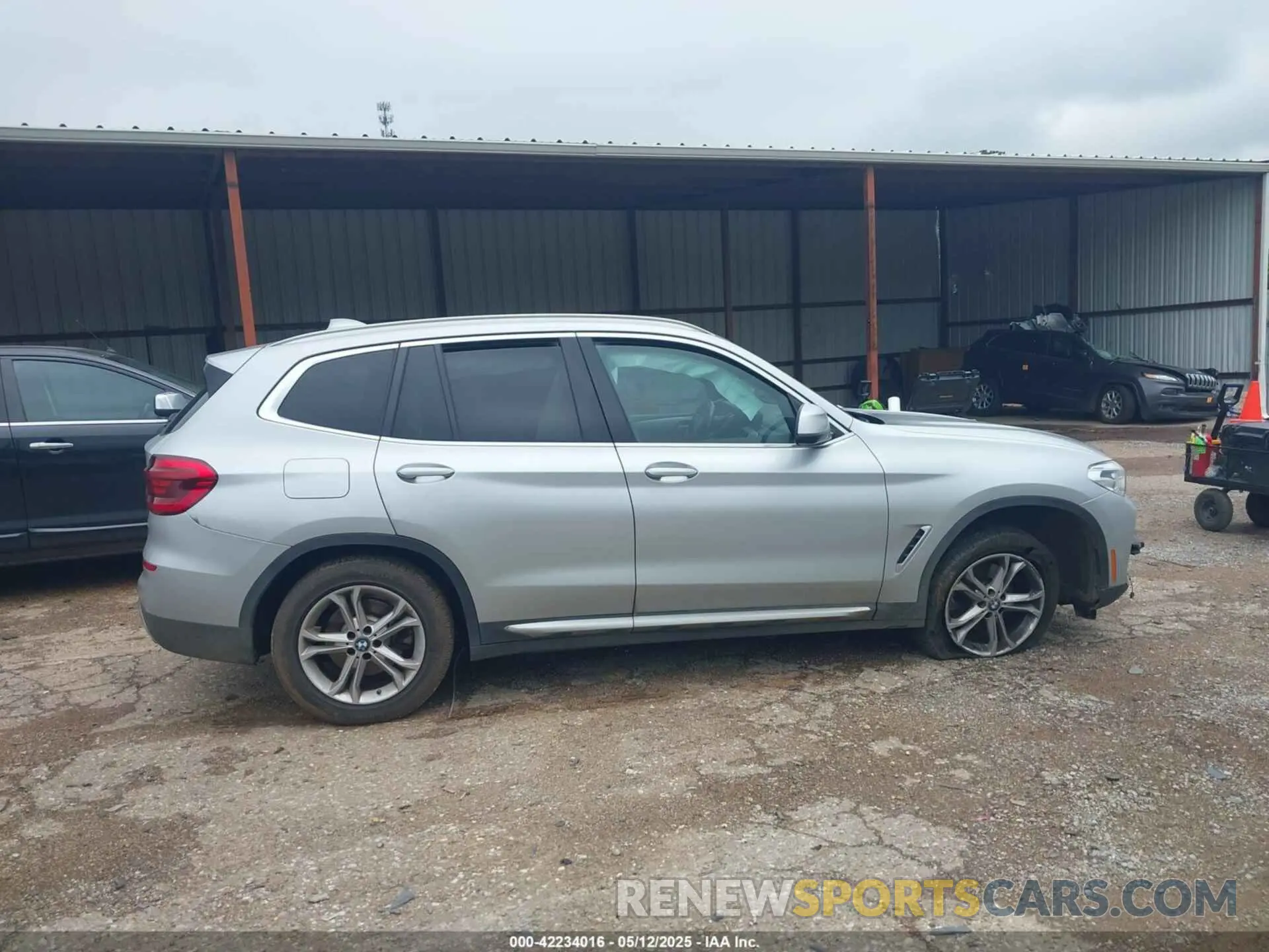 13 Photograph of a damaged car 5UXTY5C01M9H22613 BMW X3 2021