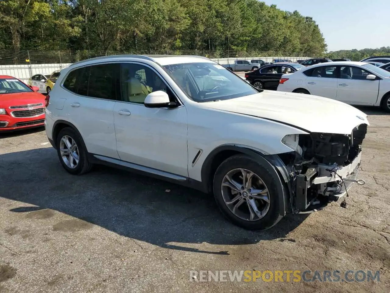 4 Photograph of a damaged car 5UXTY5C02M9G11570 BMW X3 2021