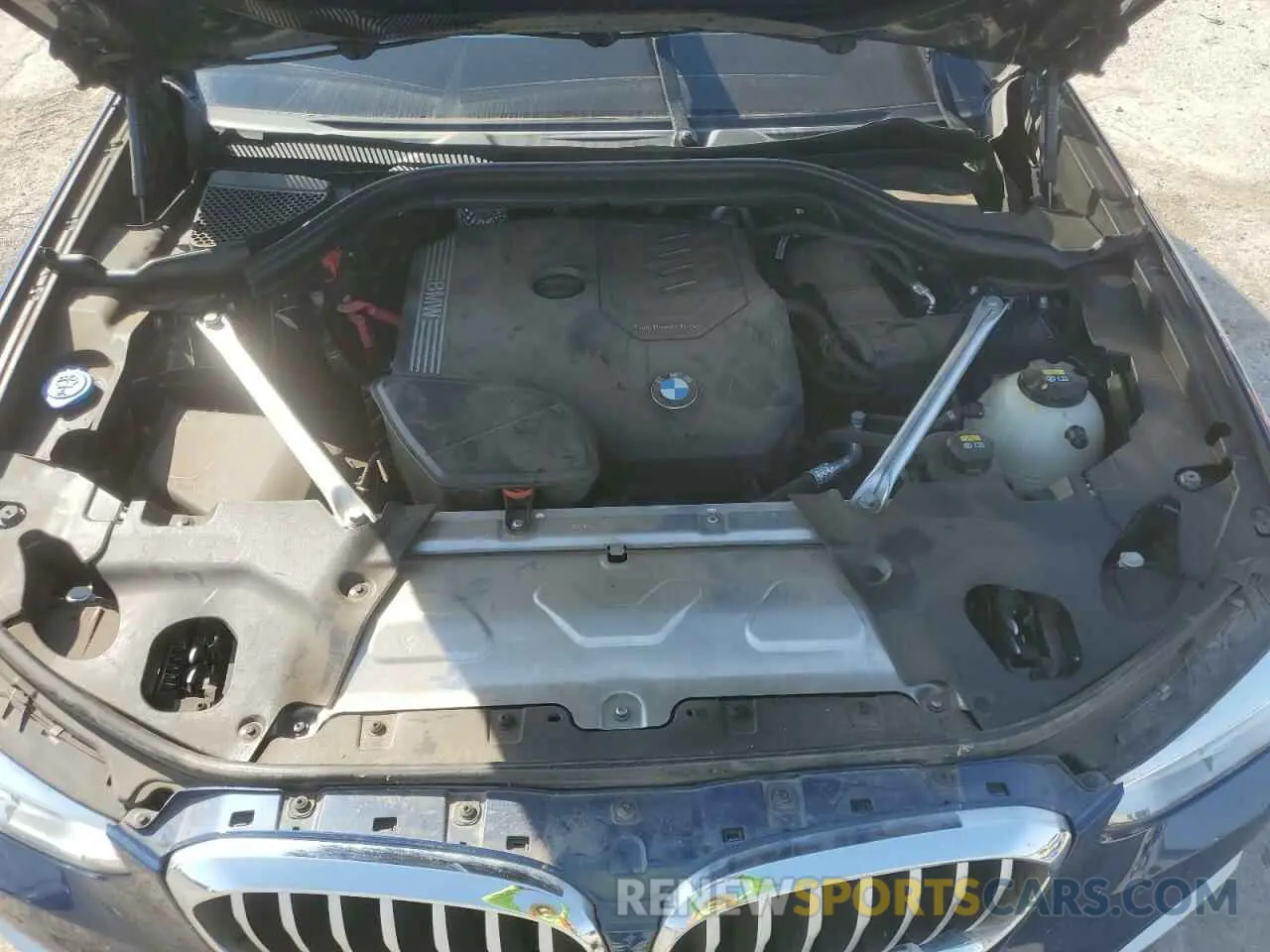 12 Photograph of a damaged car 5UXTY5C03M9E68676 BMW X3 2021