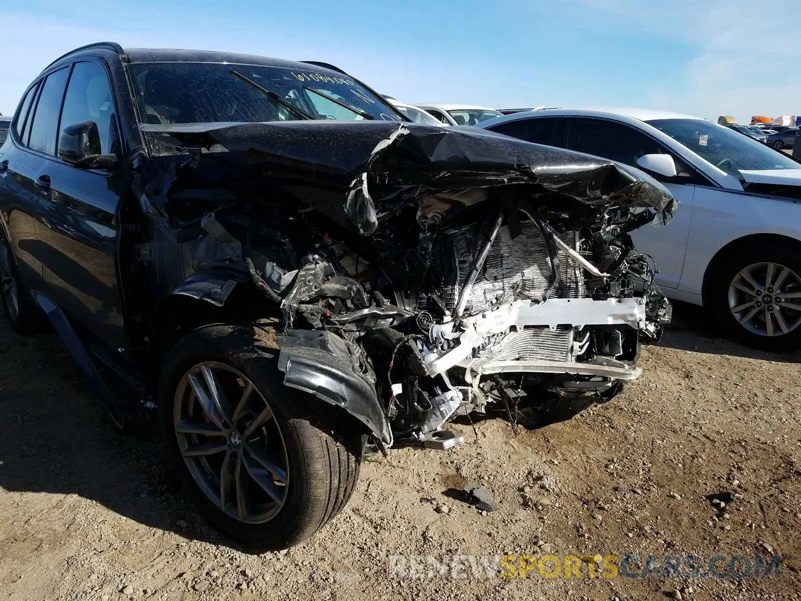 9 Photograph of a damaged car 5UXTY9C00M9F30753 BMW X3 2021
