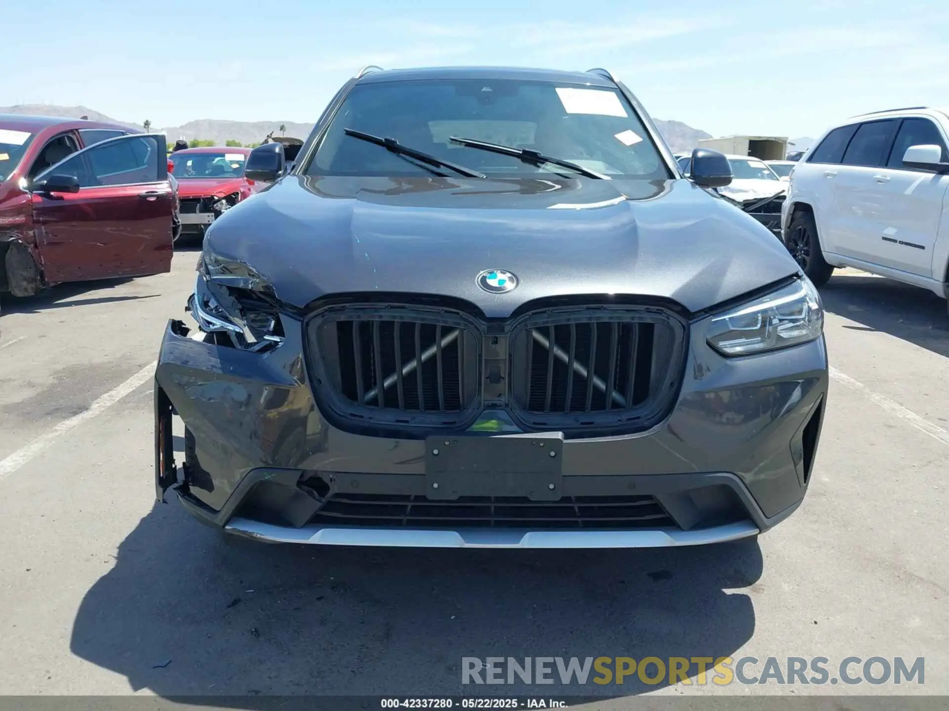 12 Photograph of a damaged car 5UX43DP01N9J41084 BMW X3 2022