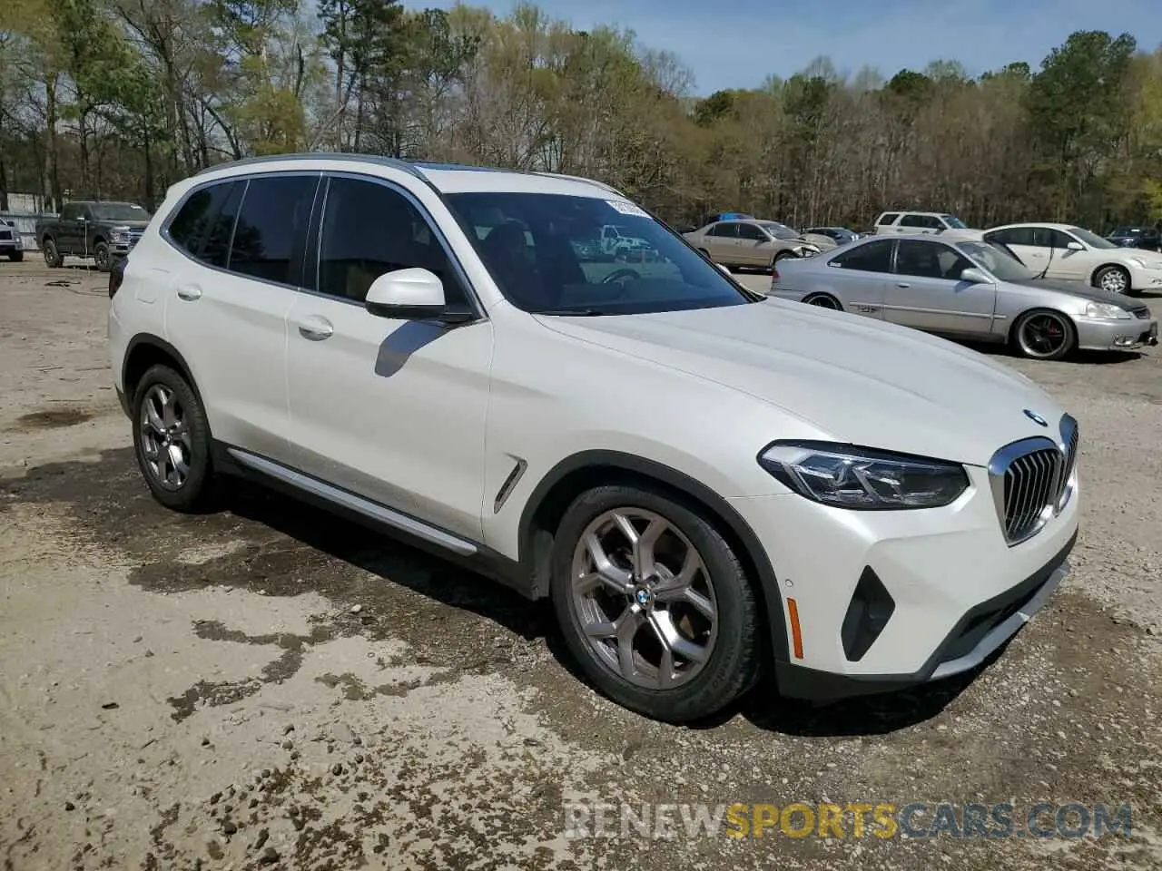 4 Photograph of a damaged car 5UX43DP02N9J36640 BMW X3 2022