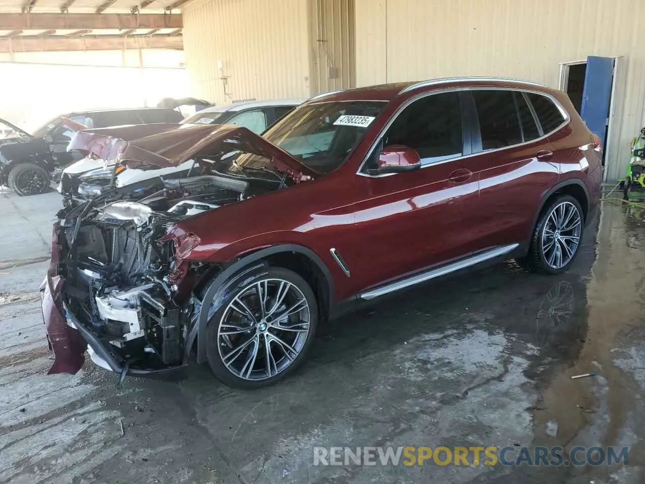 1 Photograph of a damaged car 5UX43DP02N9N15315 BMW X3 2022