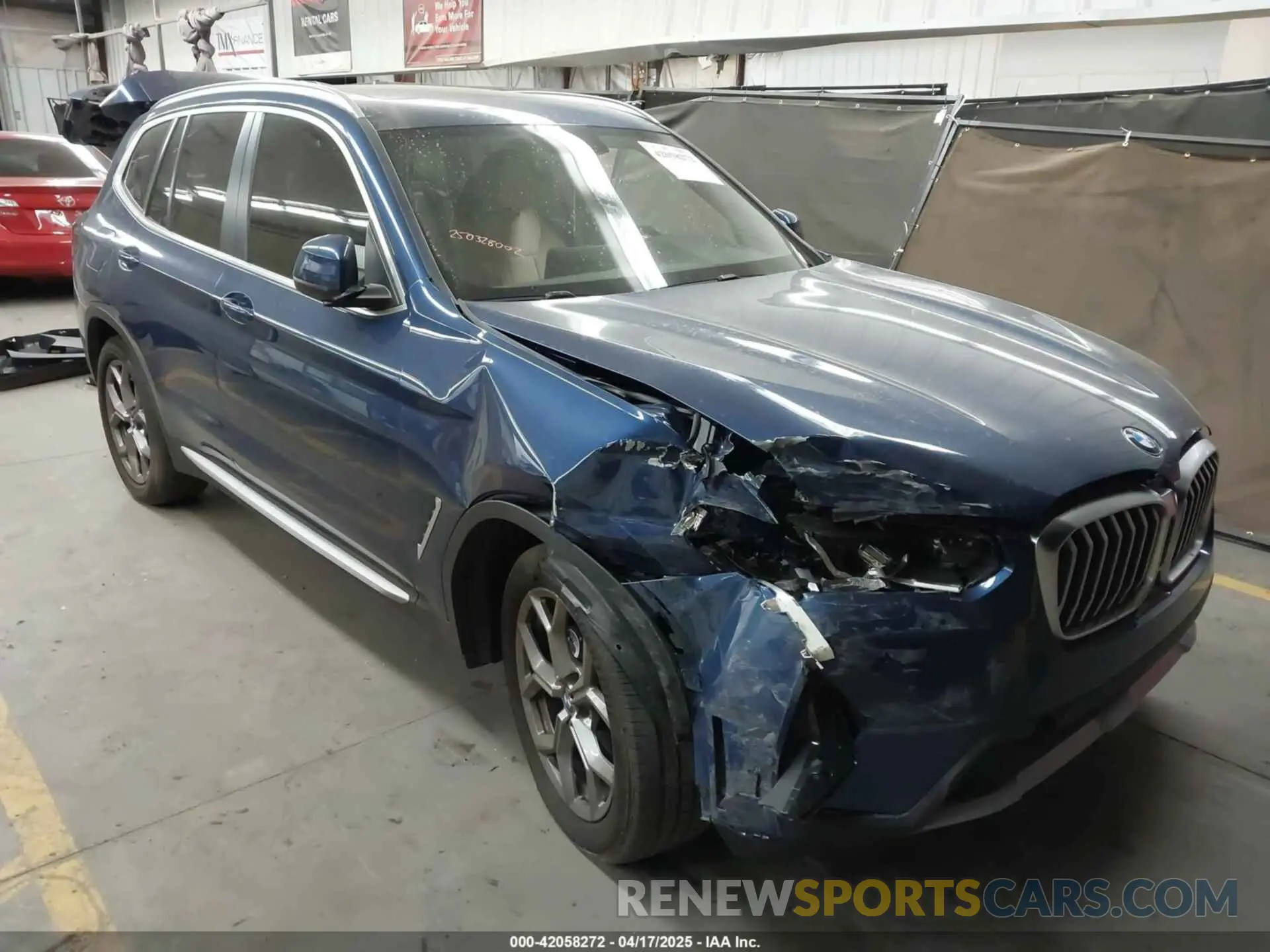1 Photograph of a damaged car 5UX43DP03N9K48816 BMW X3 2022