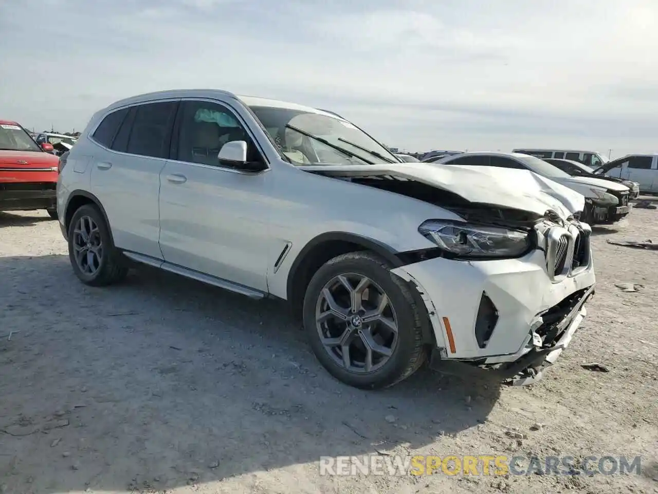 4 Photograph of a damaged car 5UX43DP03N9L84007 BMW X3 2022