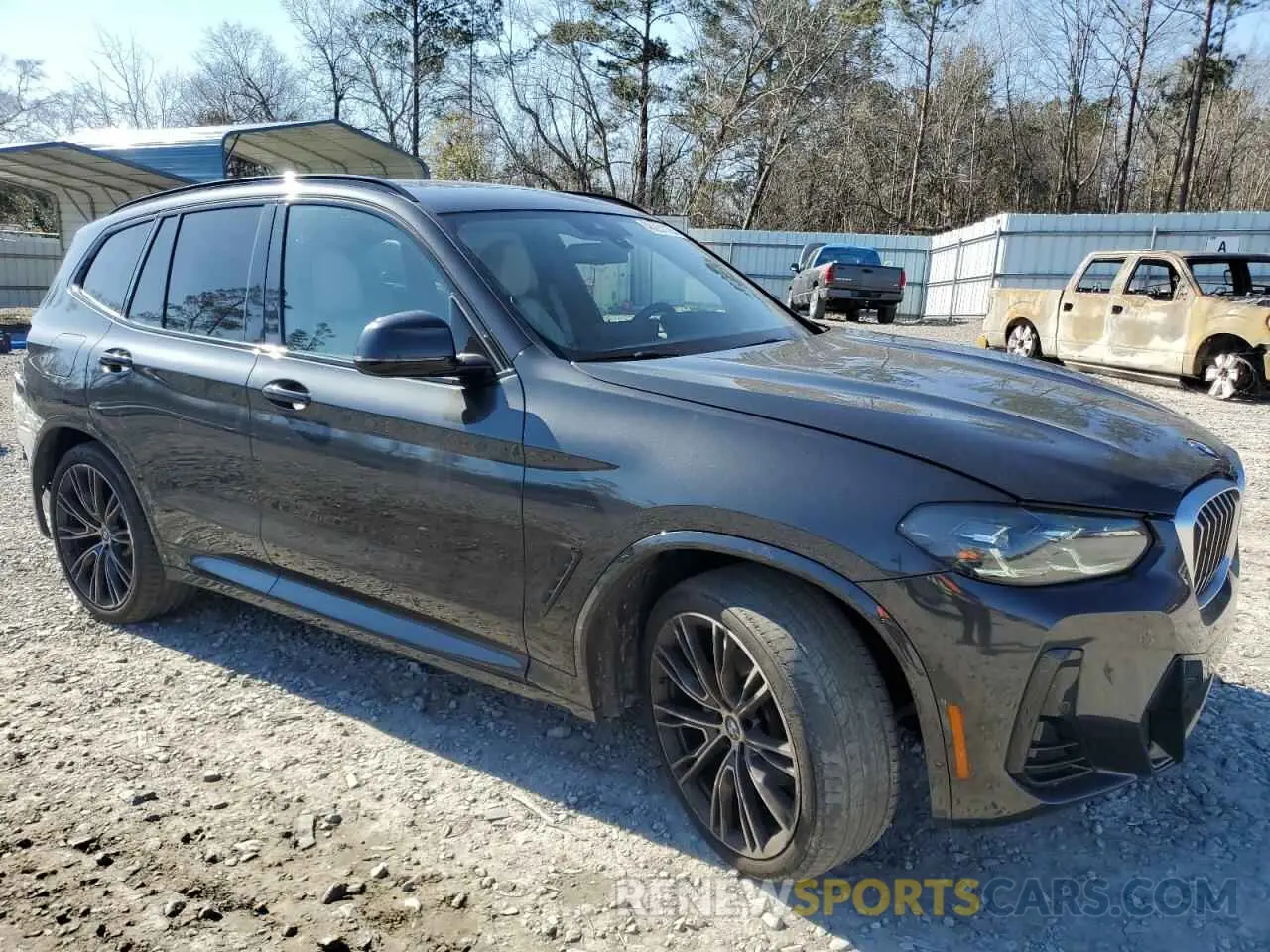 4 Photograph of a damaged car 5UX43DP04N9L67006 BMW X3 2022
