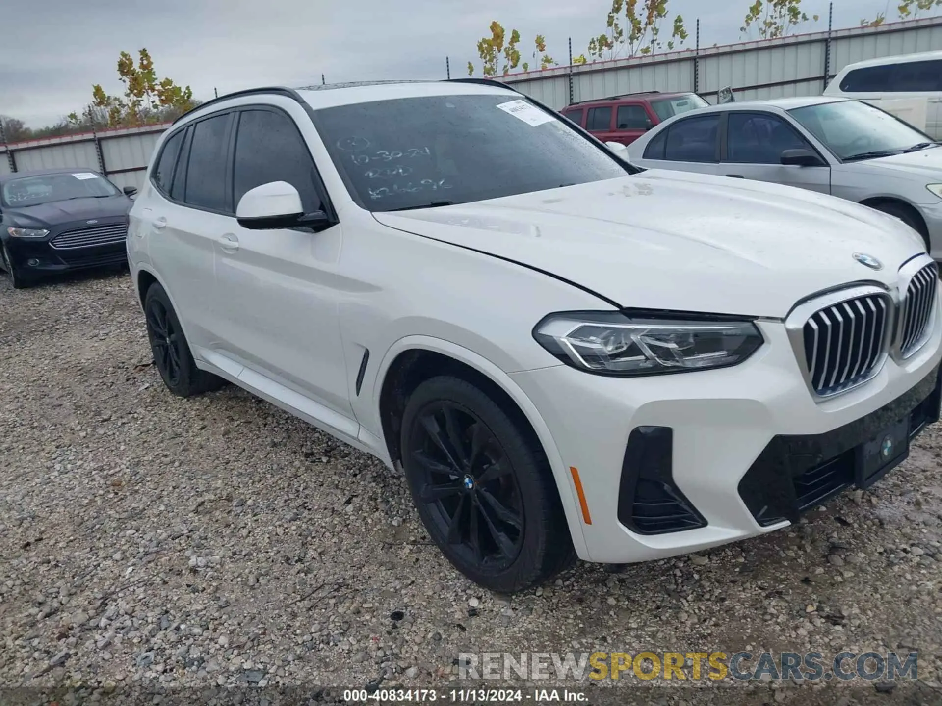 1 Photograph of a damaged car 5UX43DP08N9K26696 BMW X3 2022