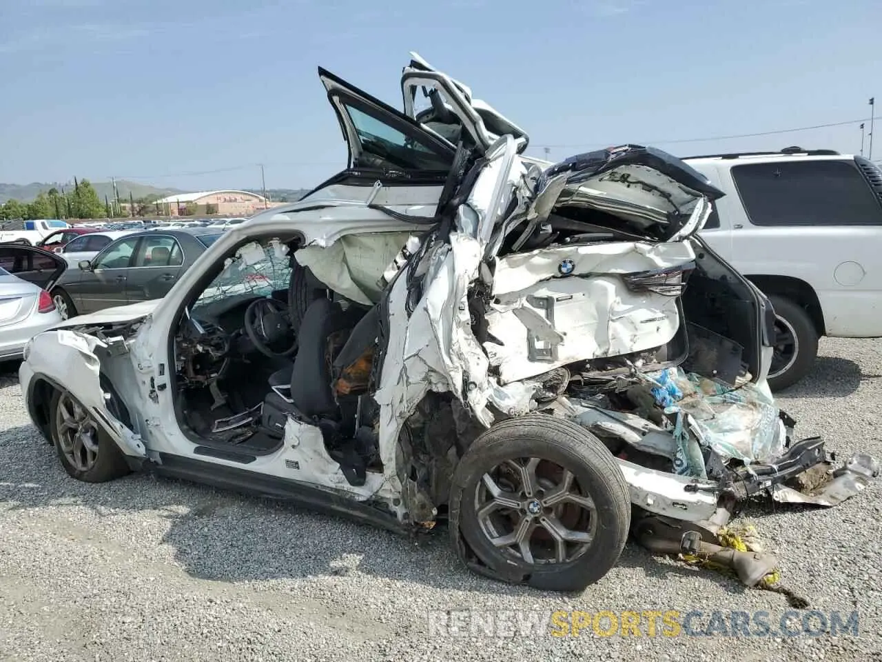 2 Photograph of a damaged car 5UX43DP08N9K66809 BMW X3 2022