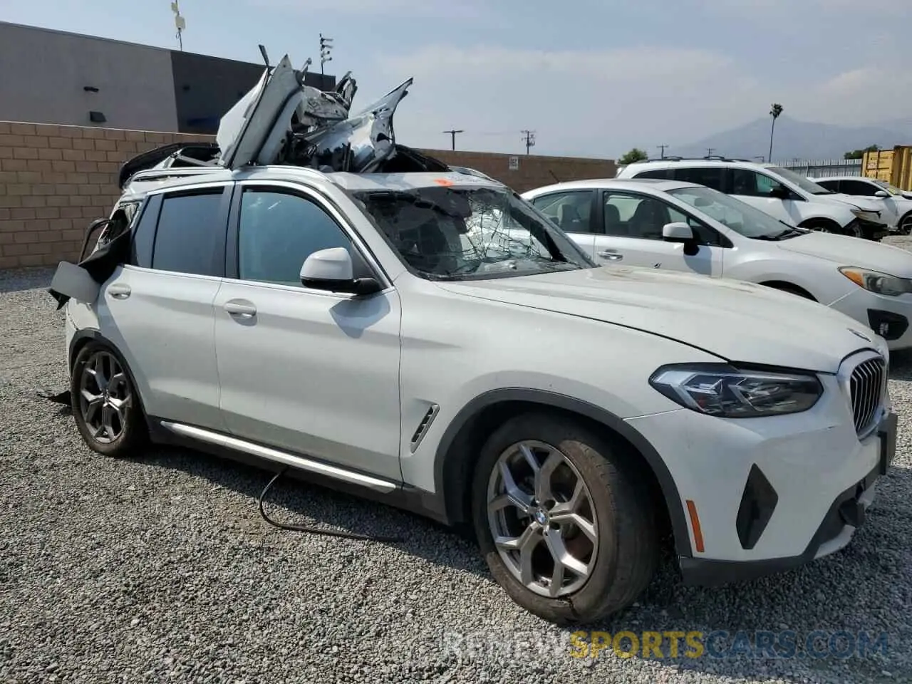 4 Photograph of a damaged car 5UX43DP08N9K66809 BMW X3 2022