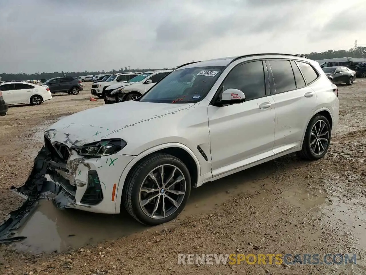 1 Photograph of a damaged car 5UX43DP08N9N39716 BMW X3 2022