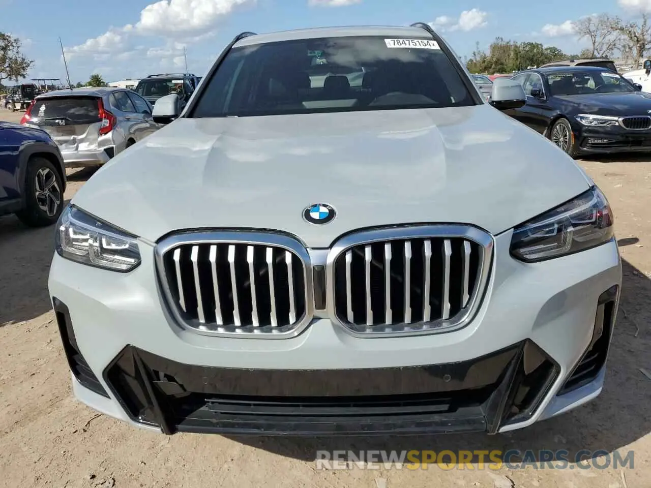 5 Photograph of a damaged car 5UX43DP09N9K72389 BMW X3 2022