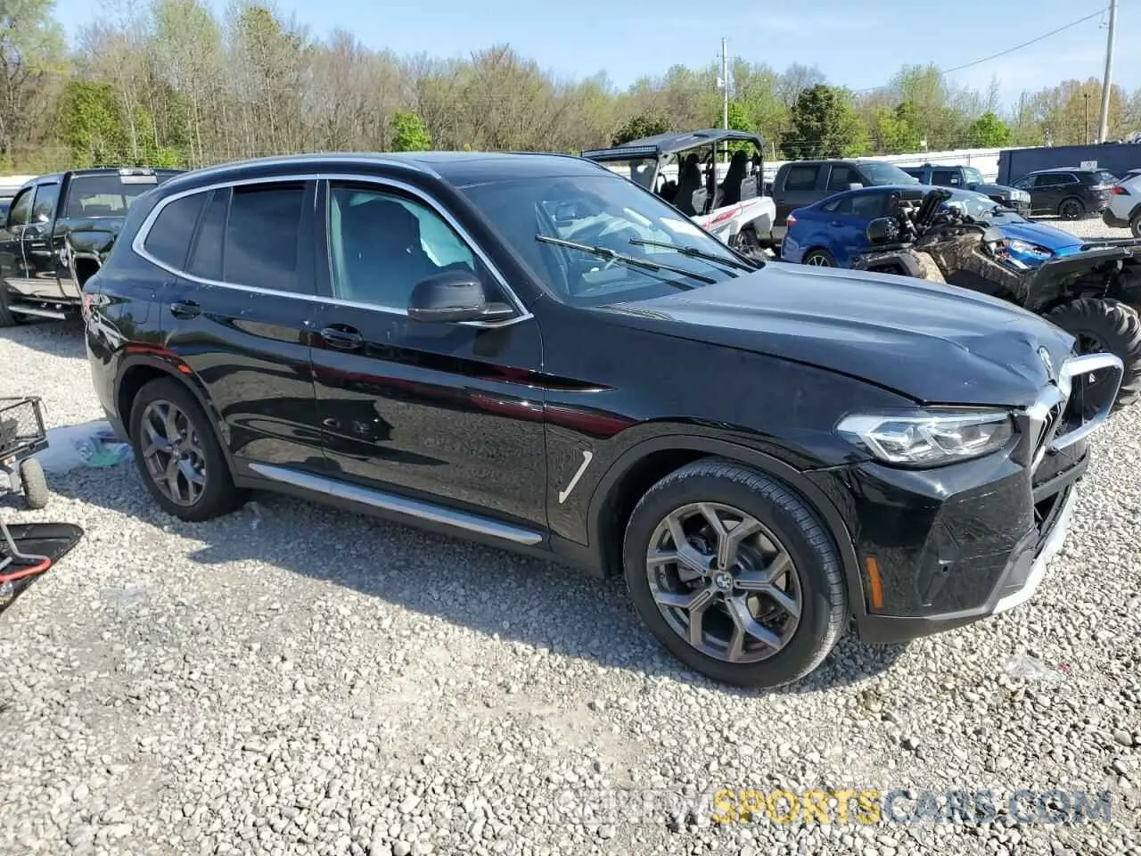 4 Photograph of a damaged car 5UX43DP0XN9M49063 BMW X3 2022