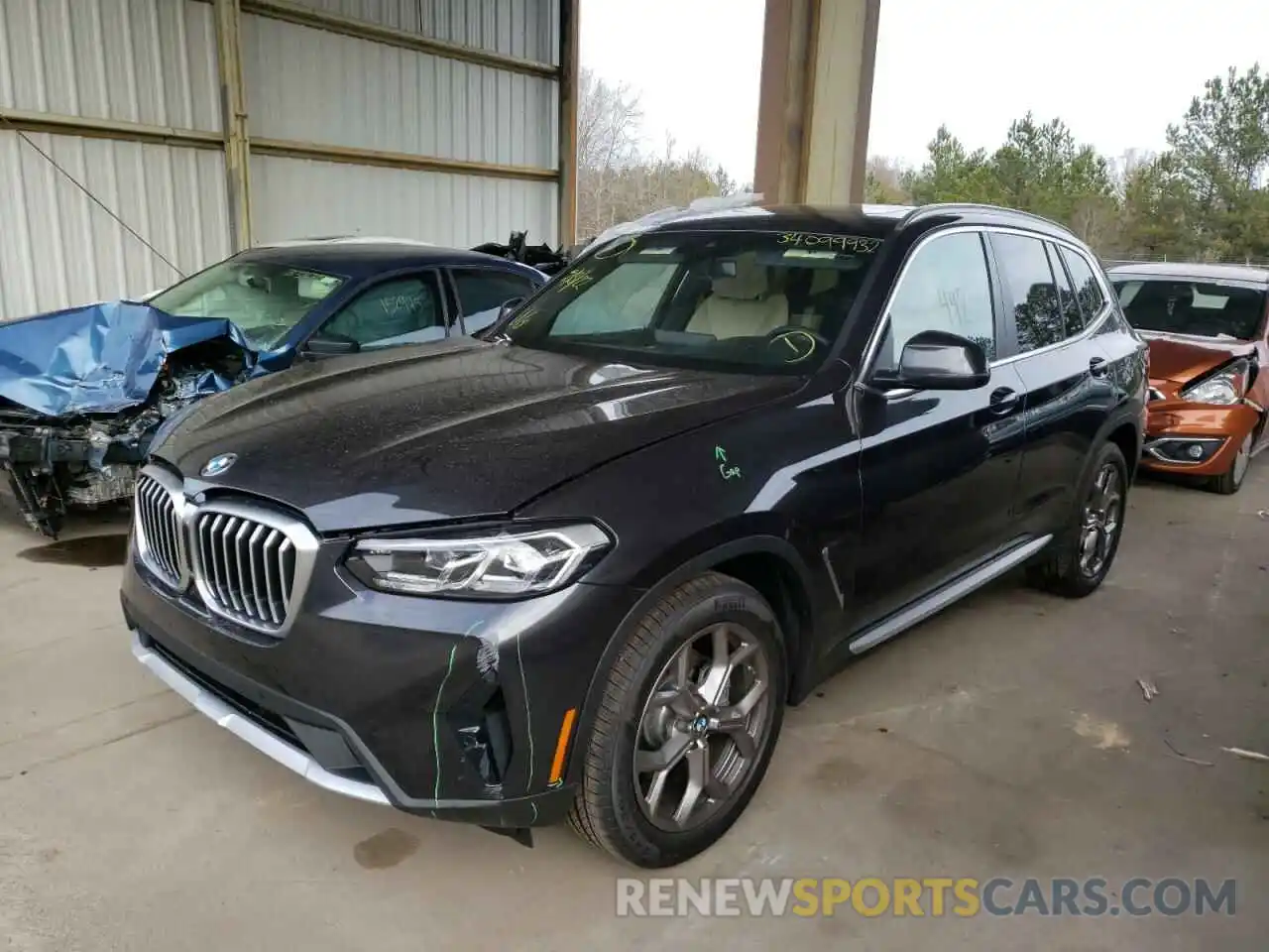 2 Photograph of a damaged car 5UX53DP00N9K53654 BMW X3 2022