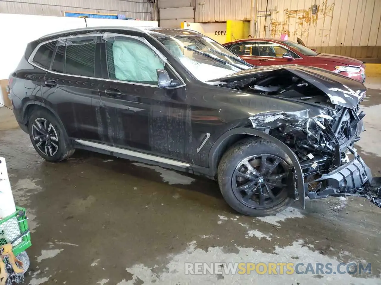4 Photograph of a damaged car 5UX53DP01N9K71578 BMW X3 2022