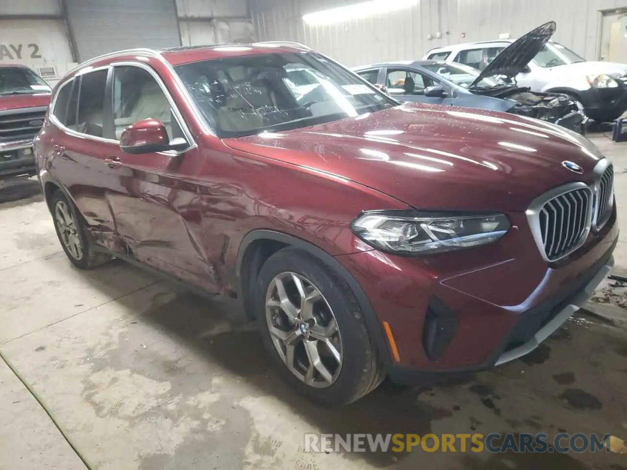 4 Photograph of a damaged car 5UX53DP01N9L32072 BMW X3 2022