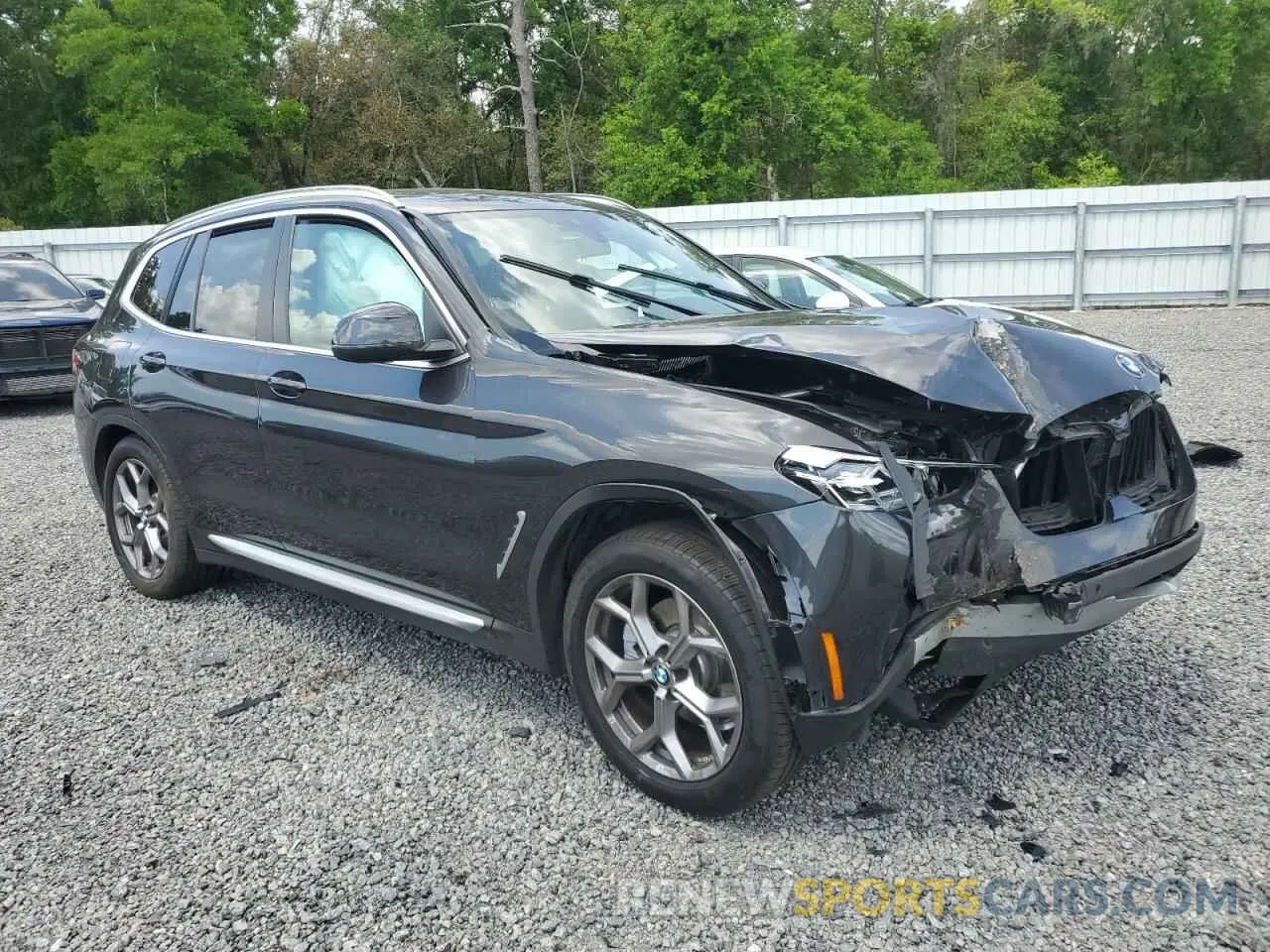 4 Photograph of a damaged car 5UX53DP02N9J36982 BMW X3 2022