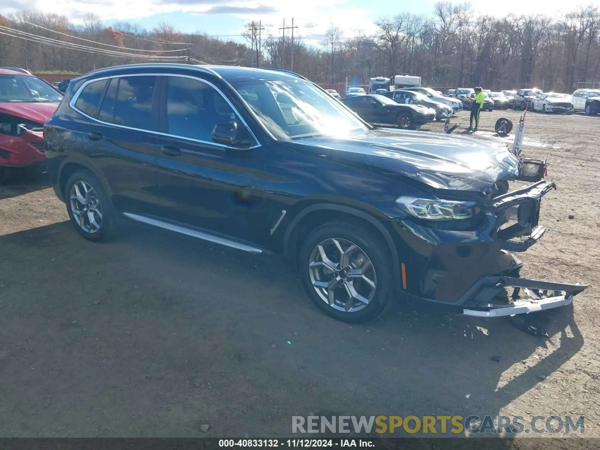 1 Photograph of a damaged car 5UX53DP03N9N34346 BMW X3 2022