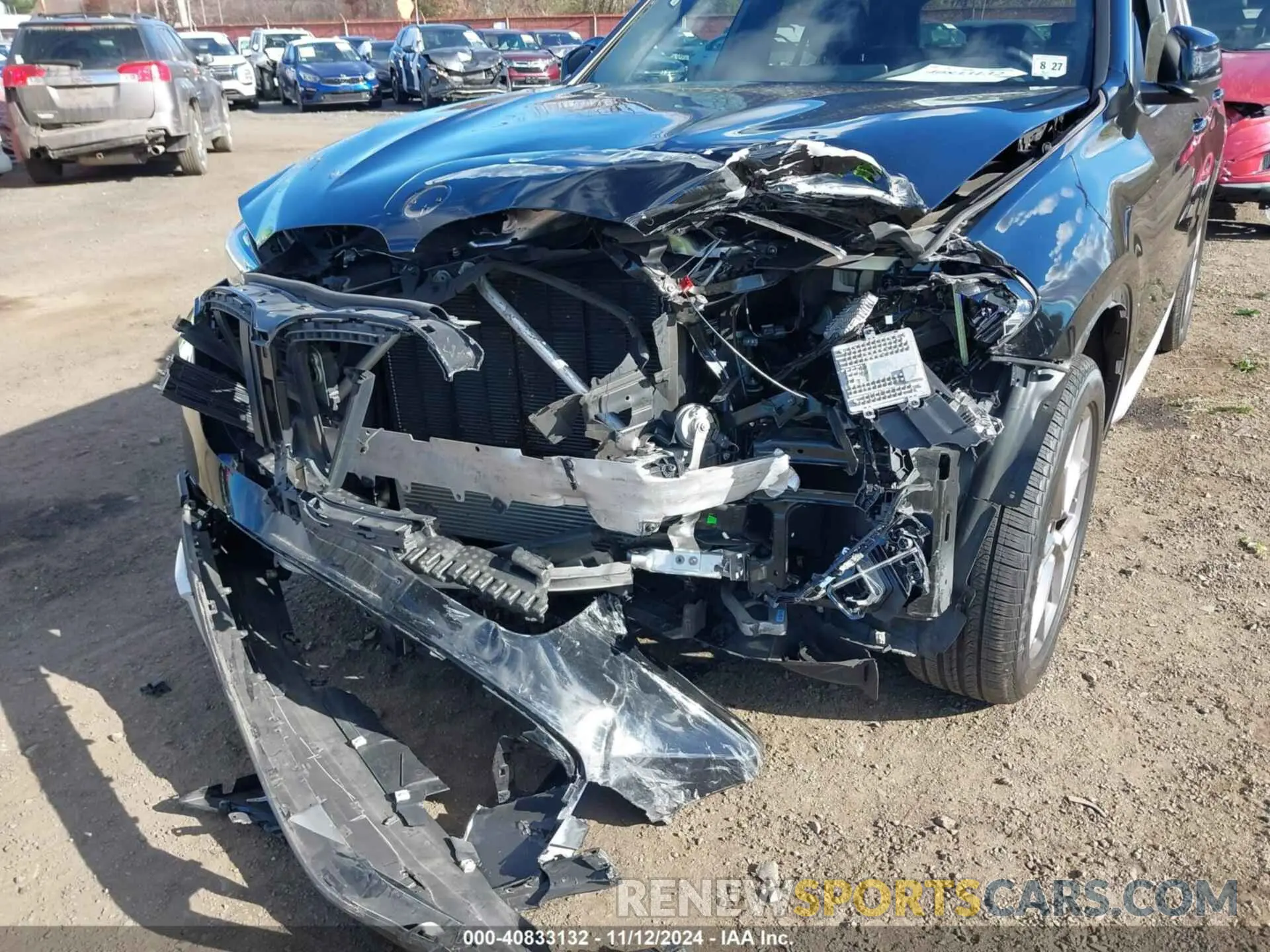6 Photograph of a damaged car 5UX53DP03N9N34346 BMW X3 2022