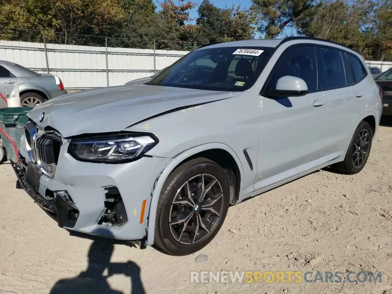 1 Photograph of a damaged car 5UX53DP06N9J21224 BMW X3 2022