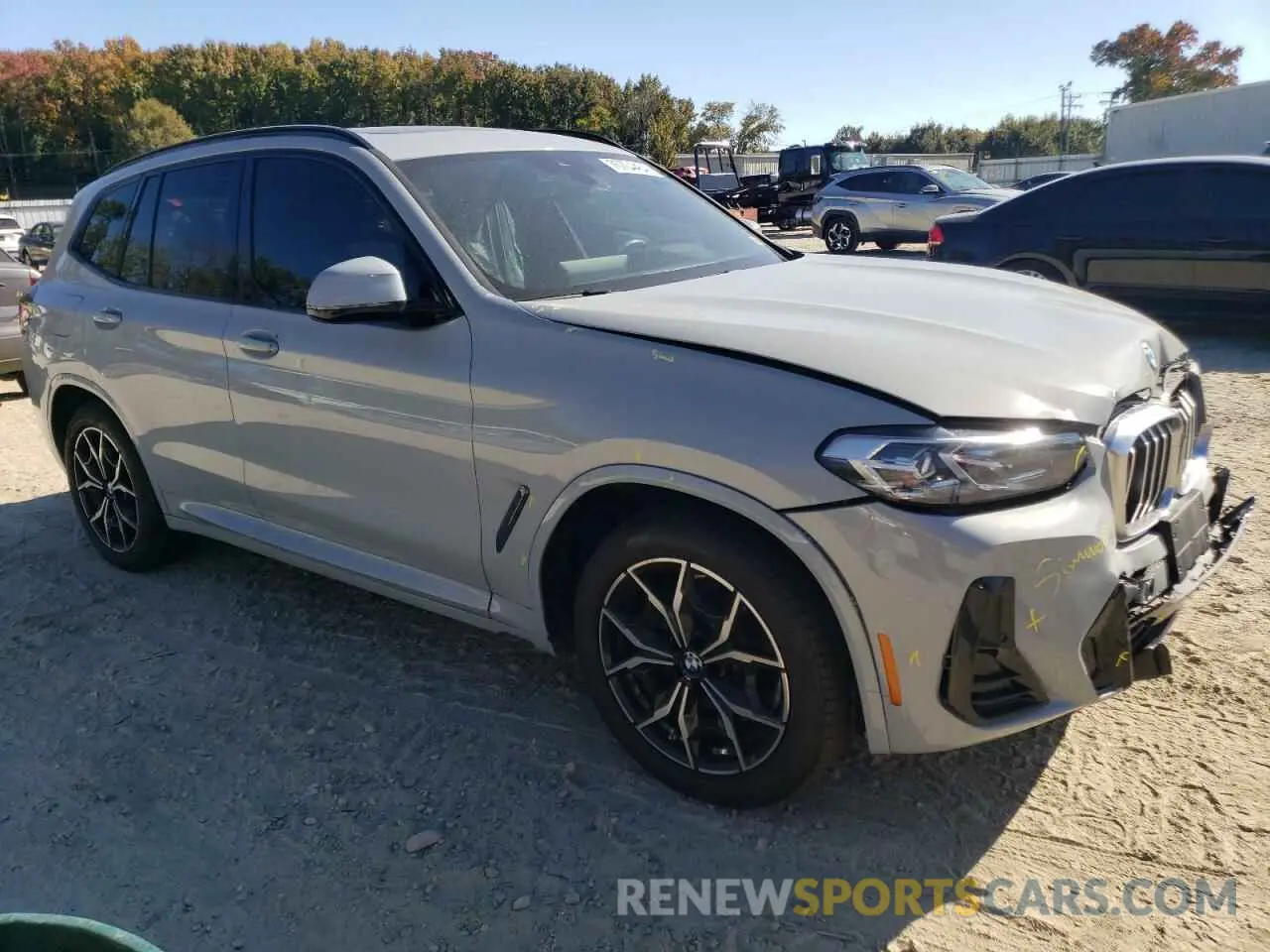 4 Photograph of a damaged car 5UX53DP06N9J21224 BMW X3 2022