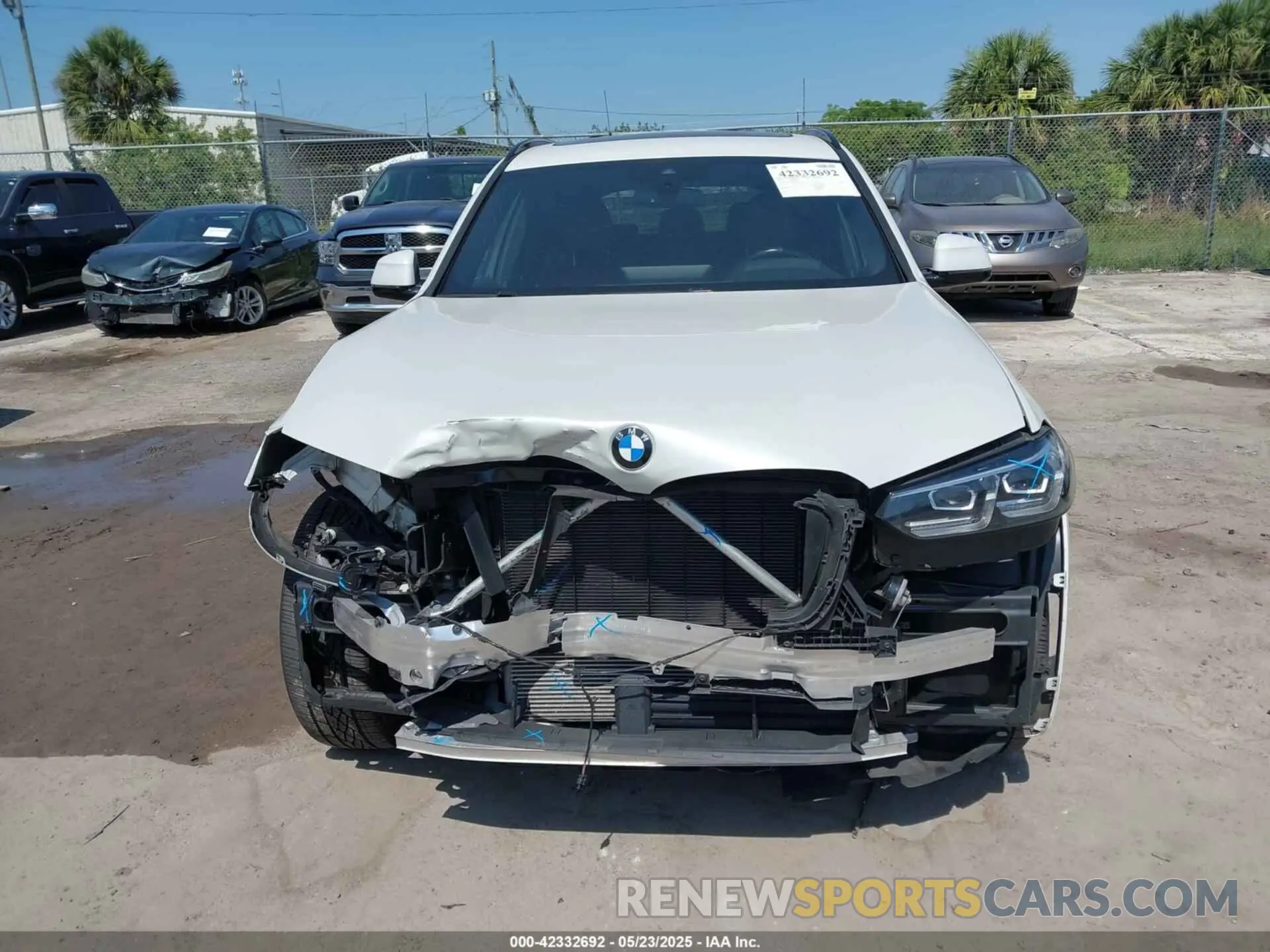 6 Photograph of a damaged car 5UX53DP06N9K02837 BMW X3 2022