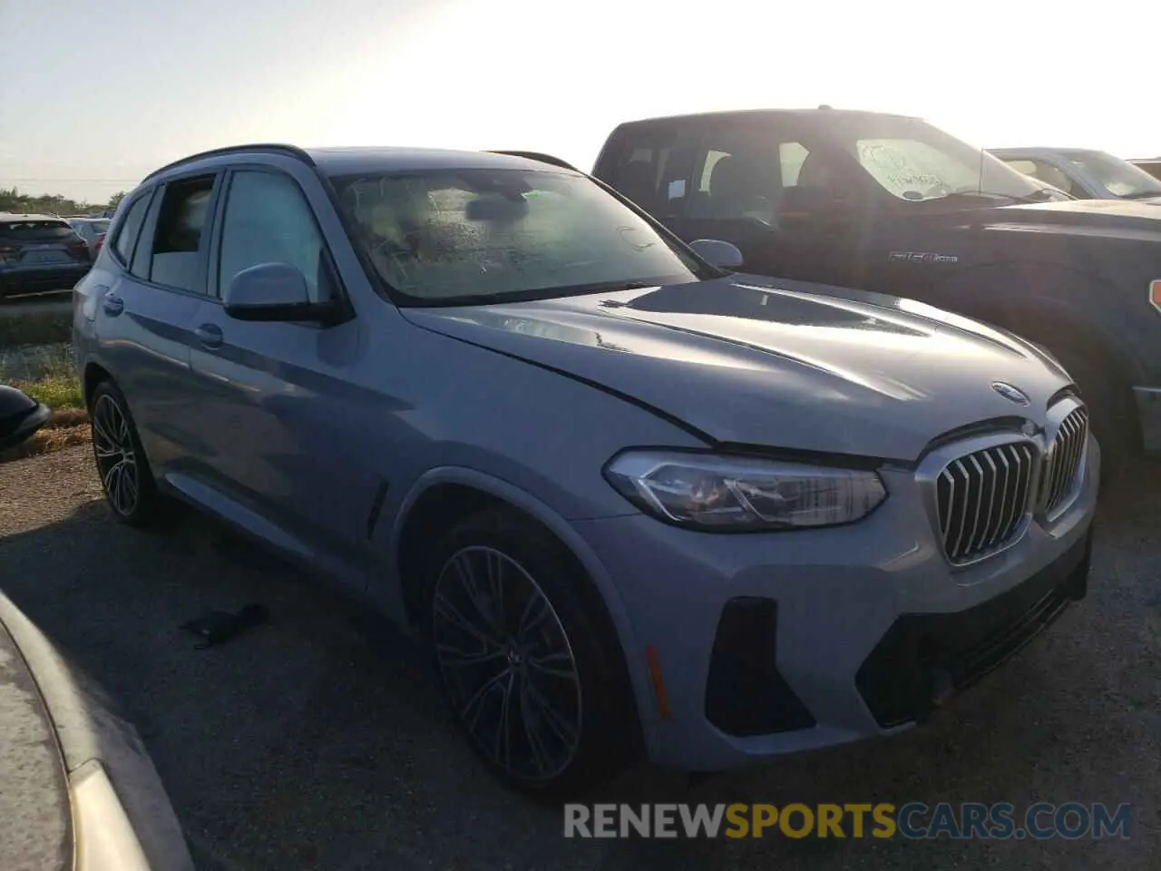 1 Photograph of a damaged car 5UX53DP06N9K50385 BMW X3 2022