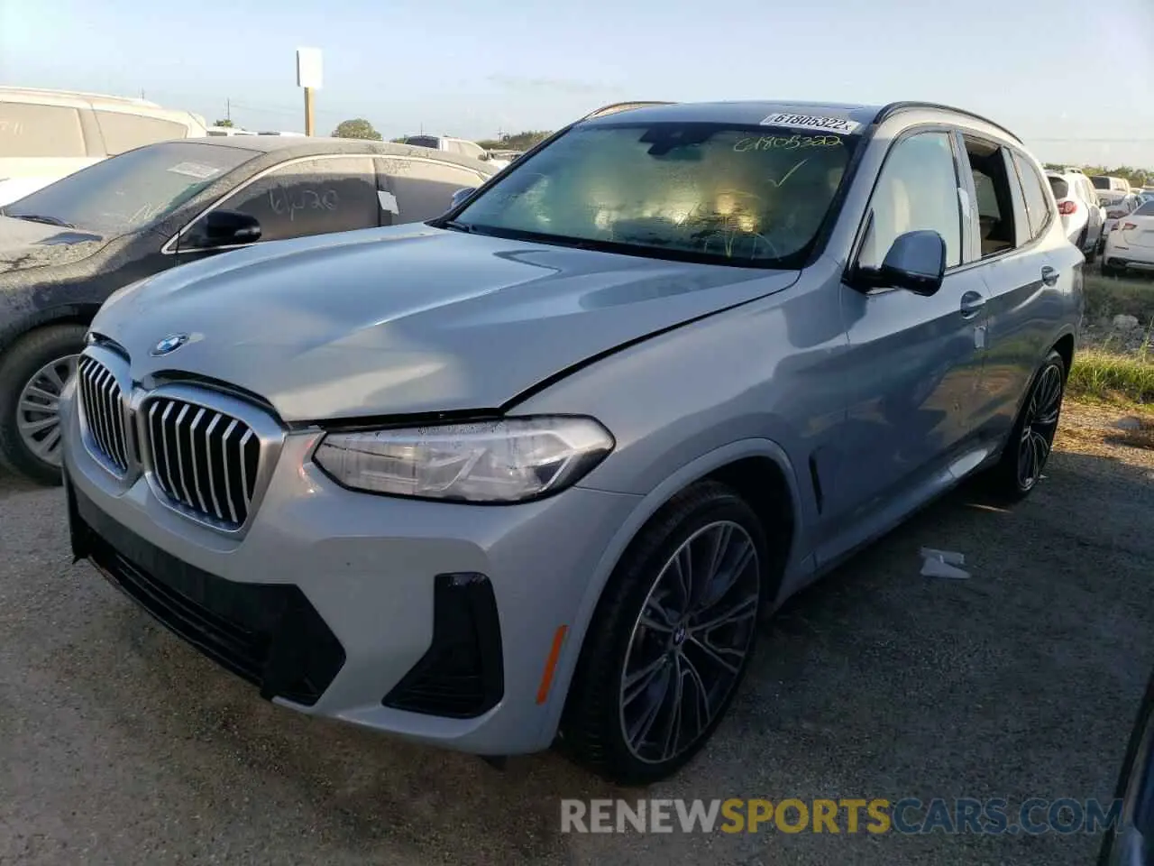 2 Photograph of a damaged car 5UX53DP06N9K50385 BMW X3 2022