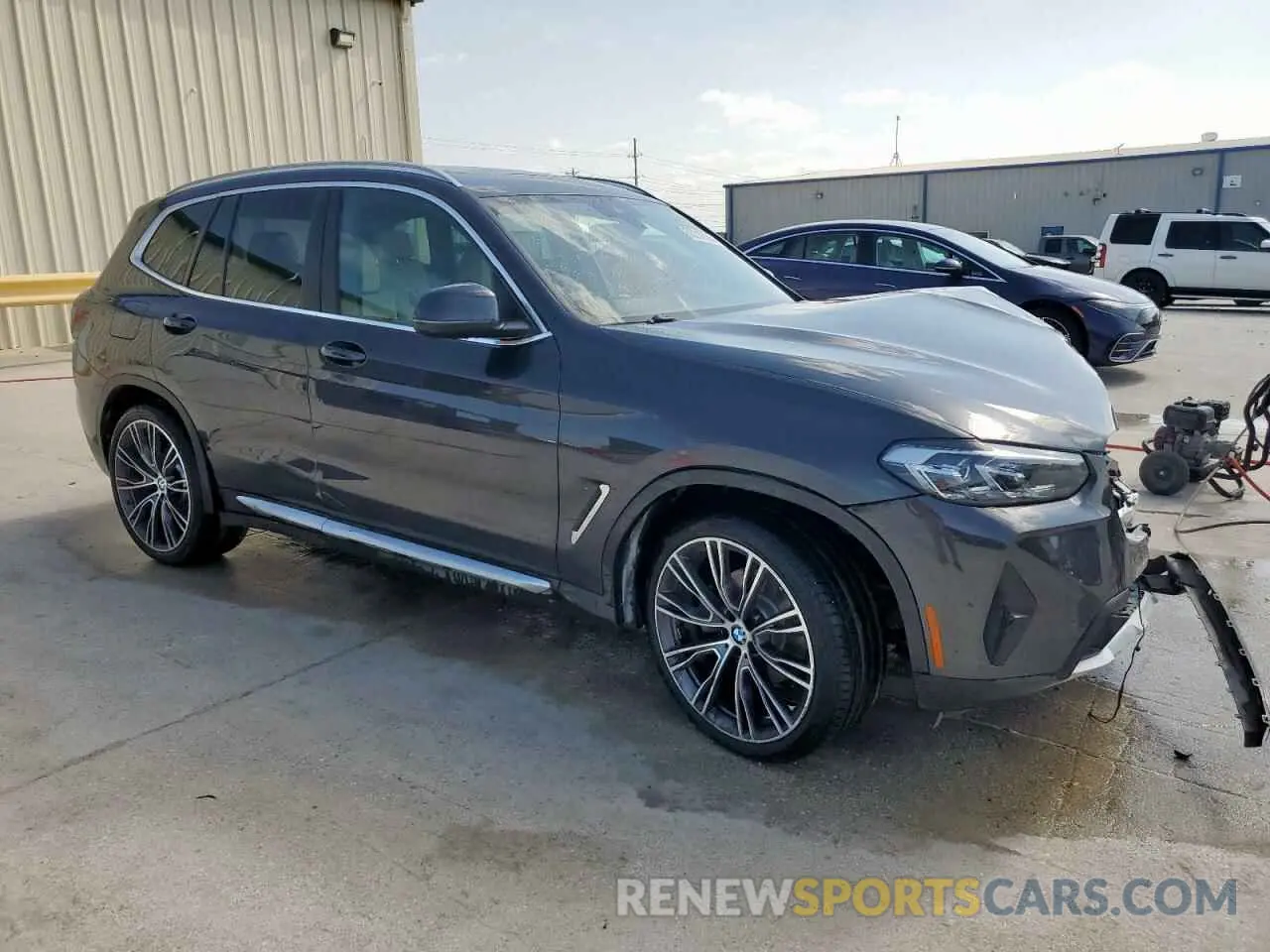 4 Photograph of a damaged car 5UX53DP06N9K99974 BMW X3 2022