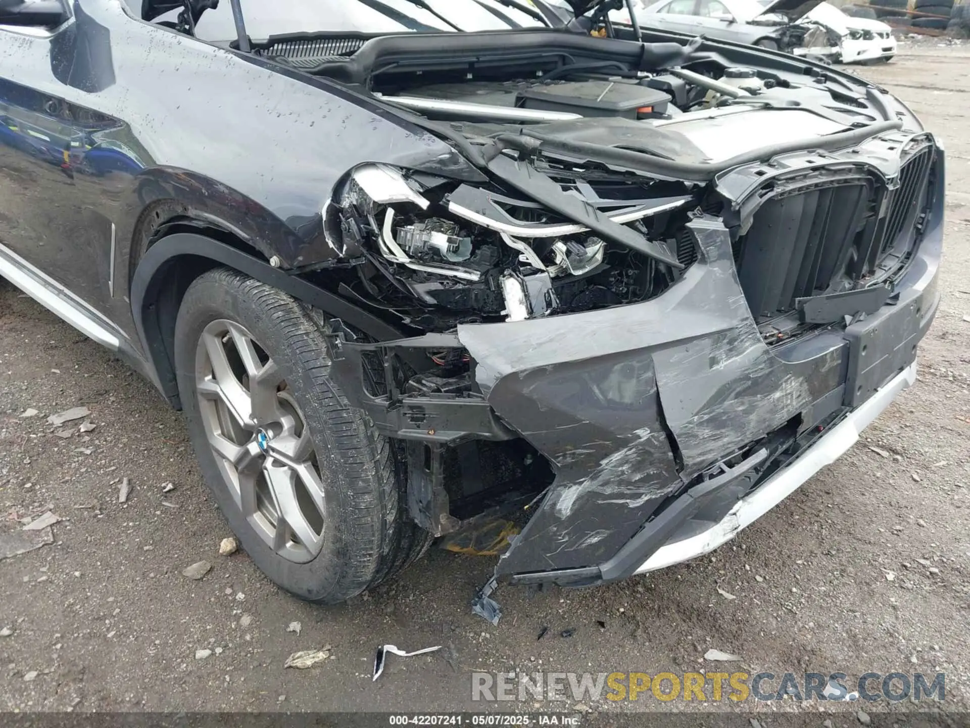 6 Photograph of a damaged car 5UX53DP07N9J81478 BMW X3 2022