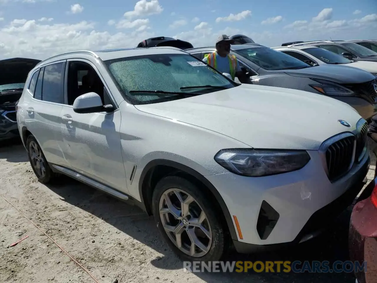4 Photograph of a damaged car 5UX53DP07N9L96603 BMW X3 2022