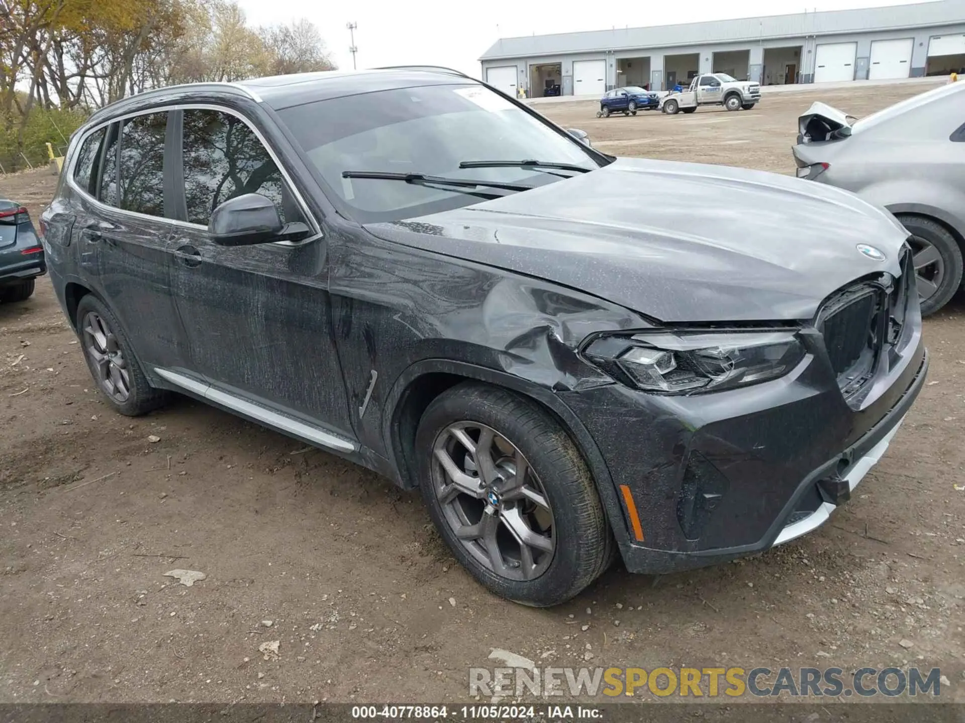 1 Photograph of a damaged car 5UX53DP09N9K53992 BMW X3 2022